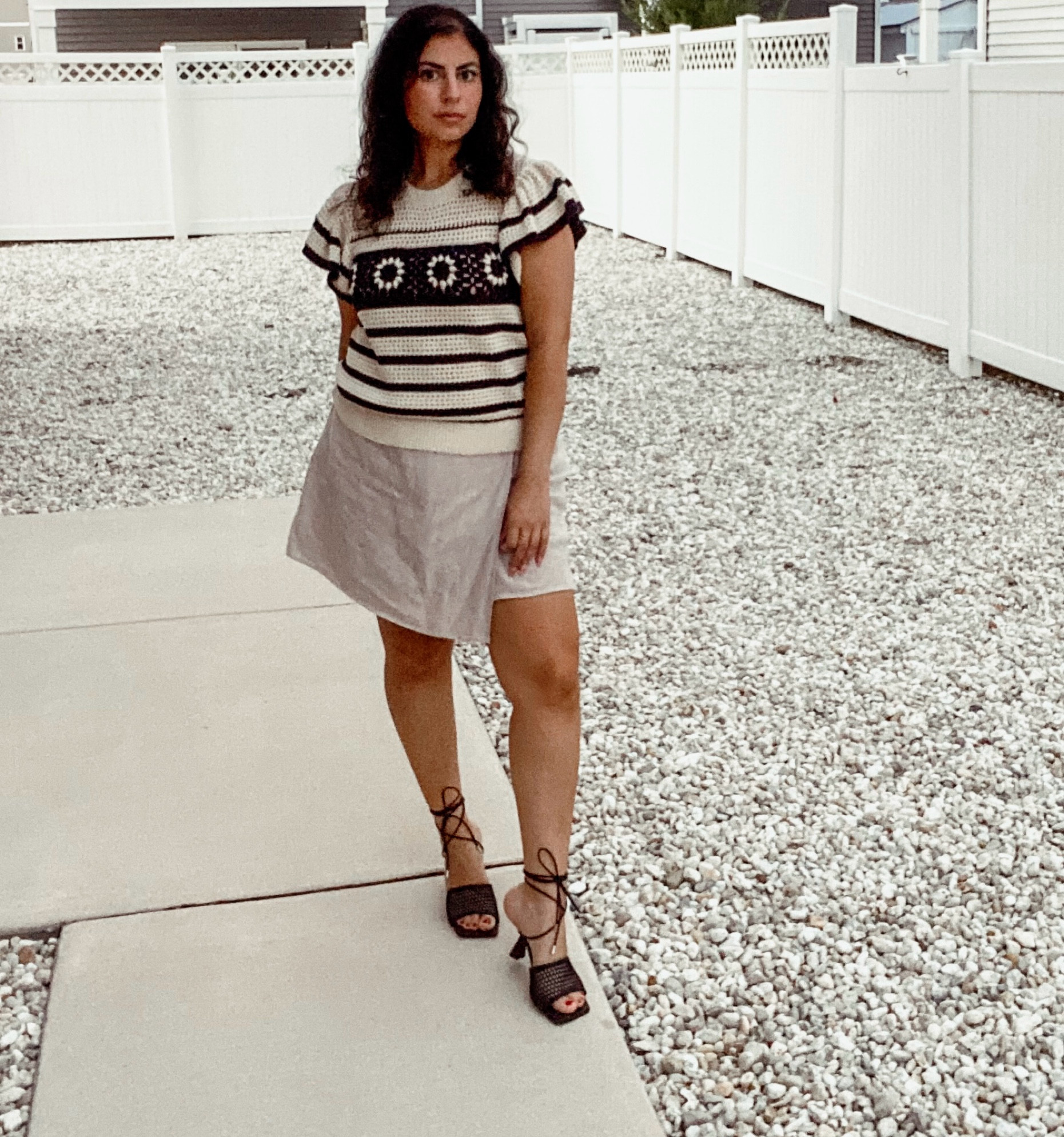 I love this shirt! I sized up and it still runs a little small so I’d def size up 1 size. My shoes are unavailable except they are on Poshmark and there are shoes on Amazon. Search the Marc Fisher LTD Dallyn Ankle Tie Sandal 