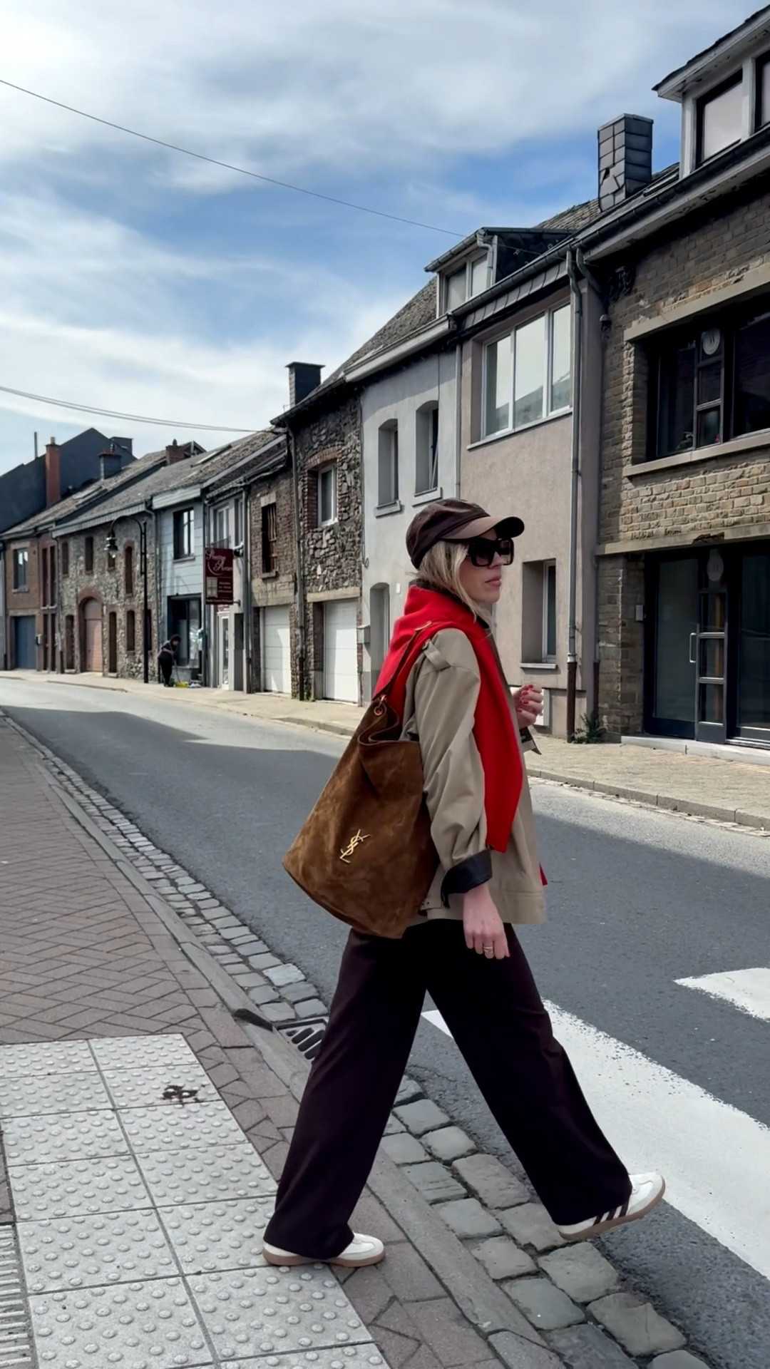Travel outfit, trench coat, sweater worn over shoulders, spring look, suede YSL bucket bag, Amazon joggers 

#LTKdayinmylife #LTKSeasonal #LTKTravel