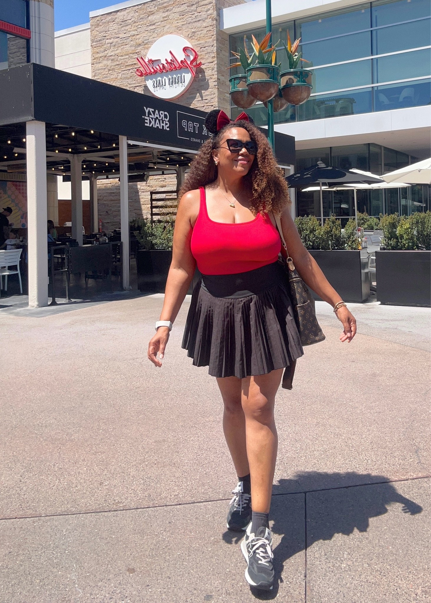 Matchy - matchy with the background at Disneyland 🐭. Bodysuit large and skort xl.

#LTKootd #LTKOver40 #LTKMidsize