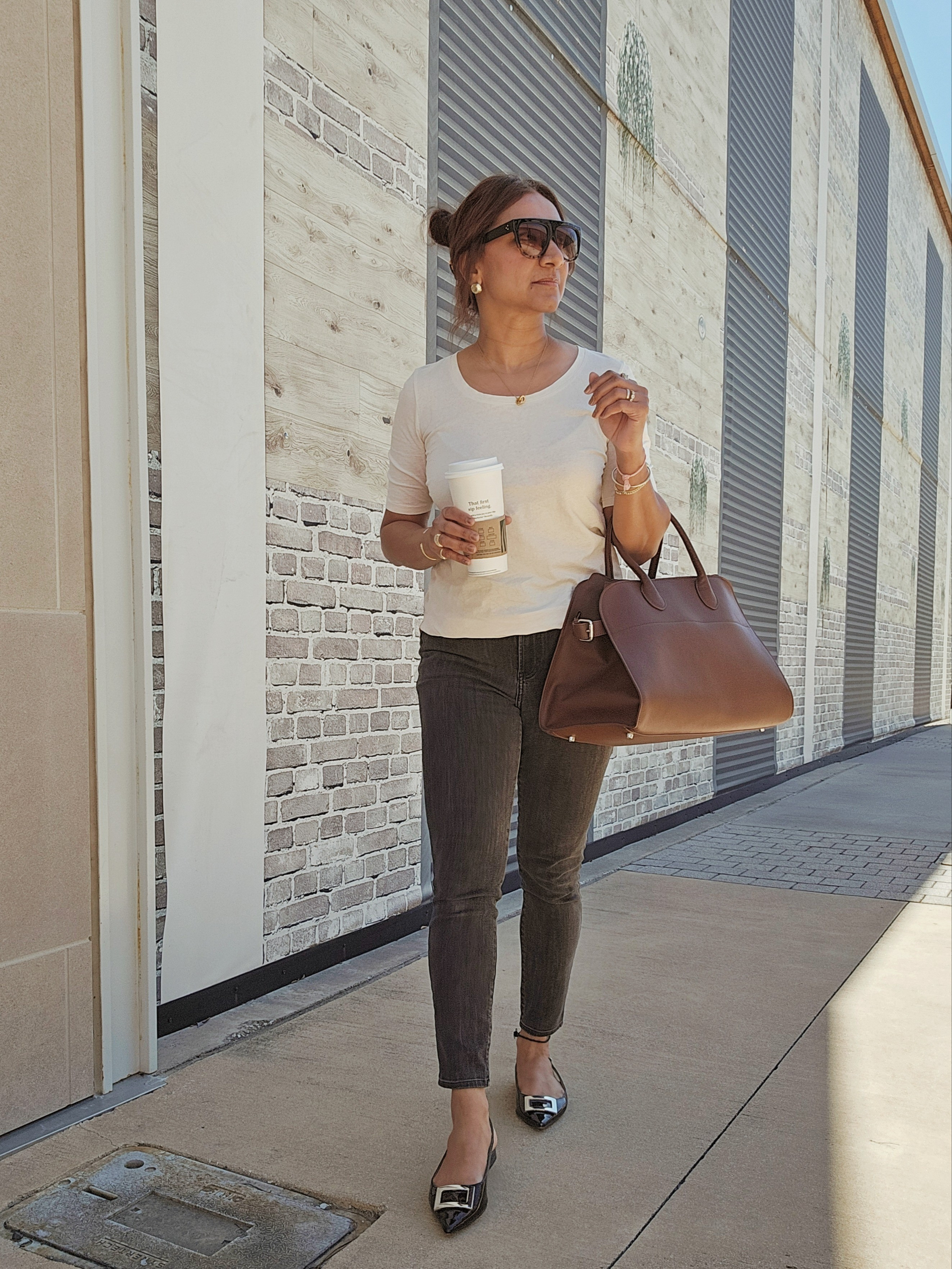 Coffee run outfit ☕️Sharing my everyday neutral look — white tee, dark denim, classic flats and my favorite tote. Easy pieces I wear on repeat.Everything linked here.white teedark wash jeansbuckle flatsbrown leather toteclassic sunglassesminimal everyday outfitcoffee run outfitcasual chic style

#LTKootd #LTKFestival #LTKmorningroutine