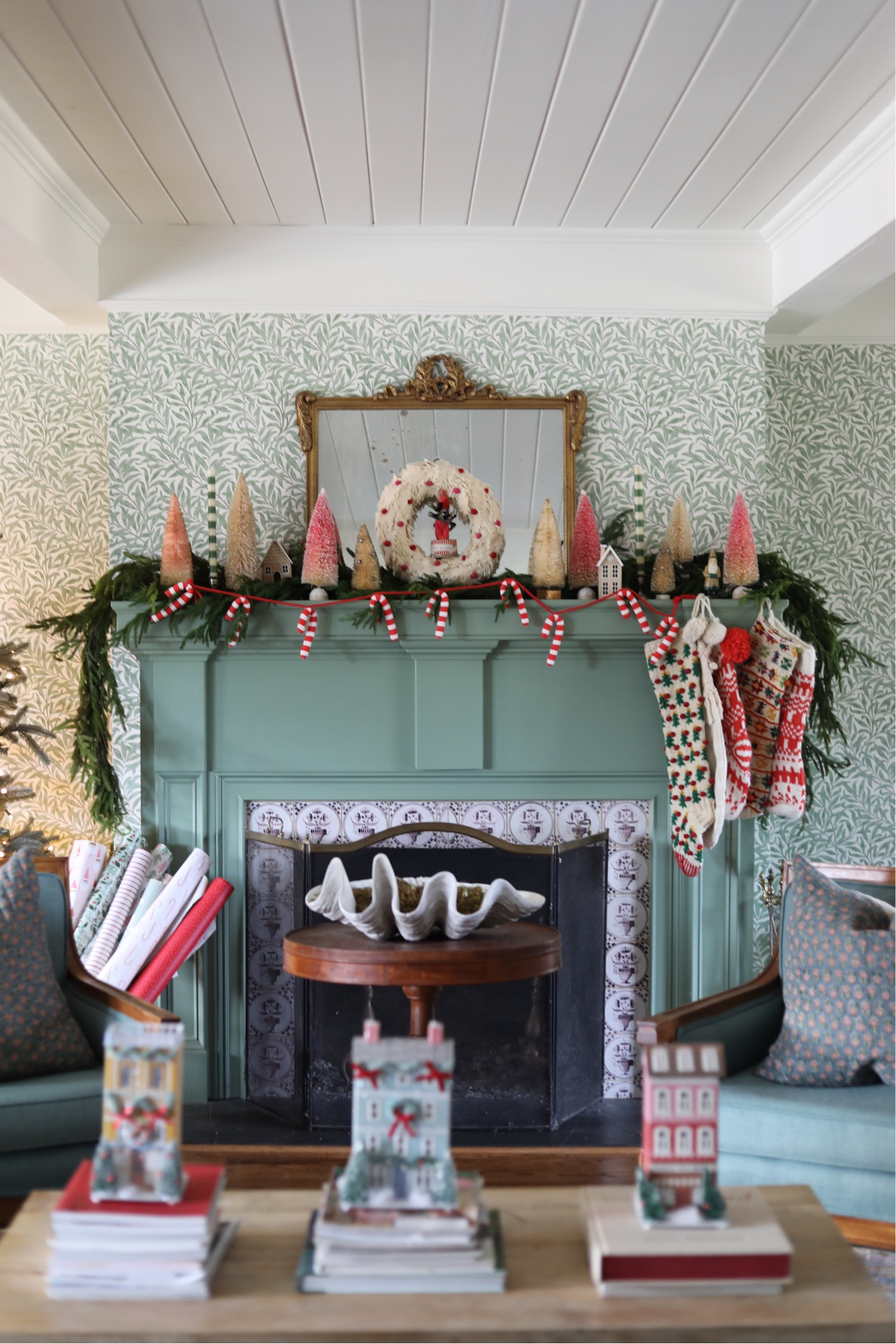 christmas mantle stockings garland wrapping paper bottle brush trees 

#LTKHoliday #LTKhome #LTKstyletip