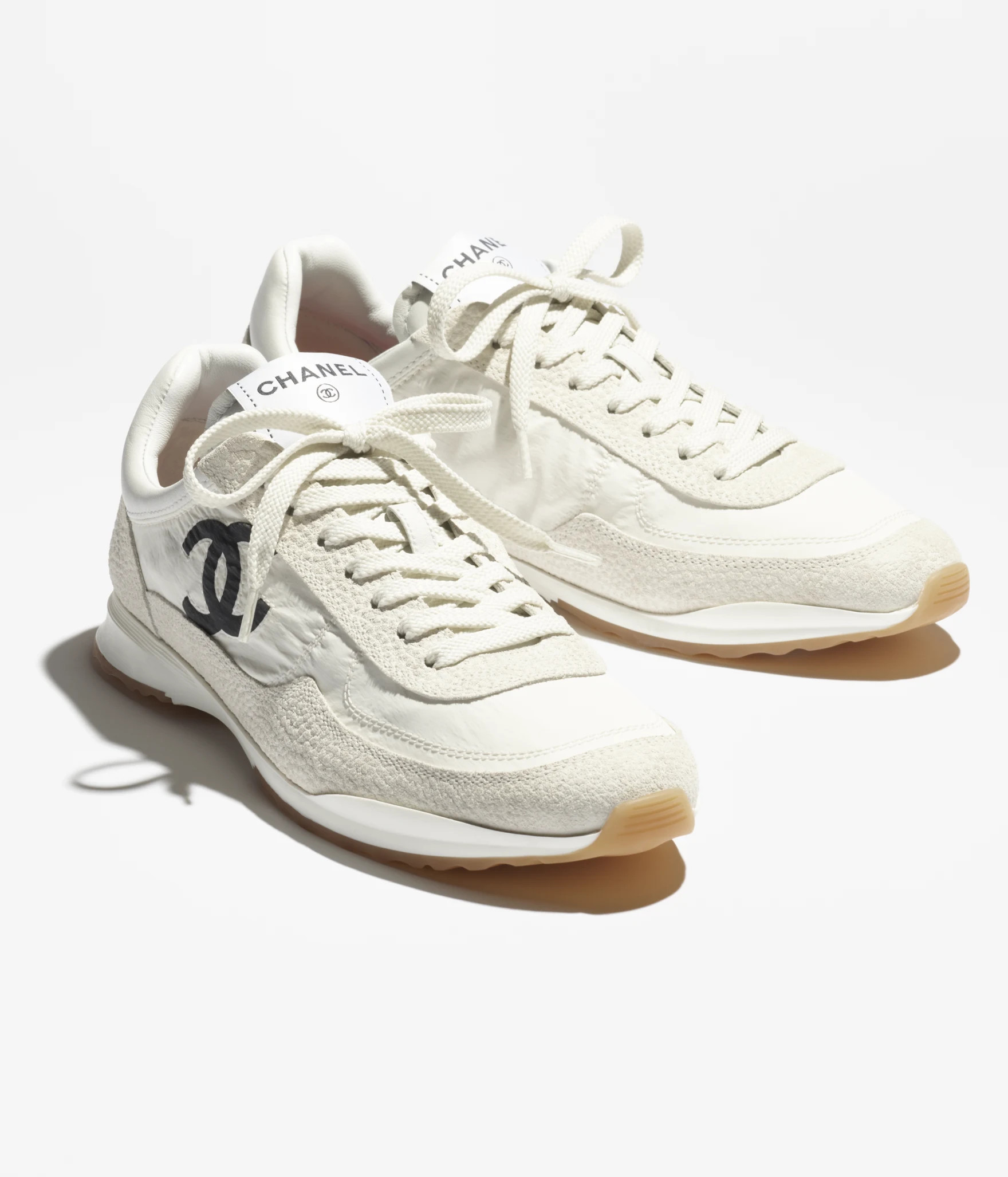 Sneakers - Fabric & embossed suede calfskin, white & black — Fashion | CHANEL | Chanel, Inc. (US)