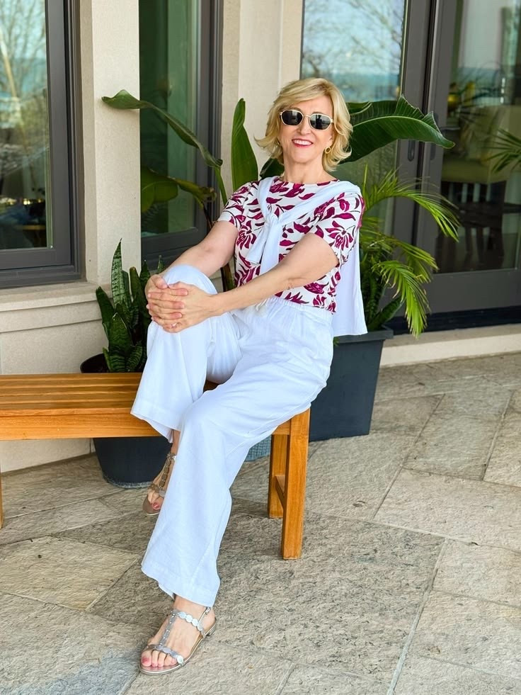 There’s something about a floral tee that just feels like an easy little dose of summer. 🌸☀️

I’m loving this one paired with crisp white linen pants—it’s such a simple combination, but it feels so fresh and put together. The florals add a soft, feminine touch, while the linen keeps everything light and effortless for warm days.

I finished the look with silver sandals for just a hint of shine, and it’s one of those outfits that works for pretty much anything casual—coffee runs, errands, or a relaxed lunch with friends.

#LTKSeasonal #LTKOver40 #LTKootd