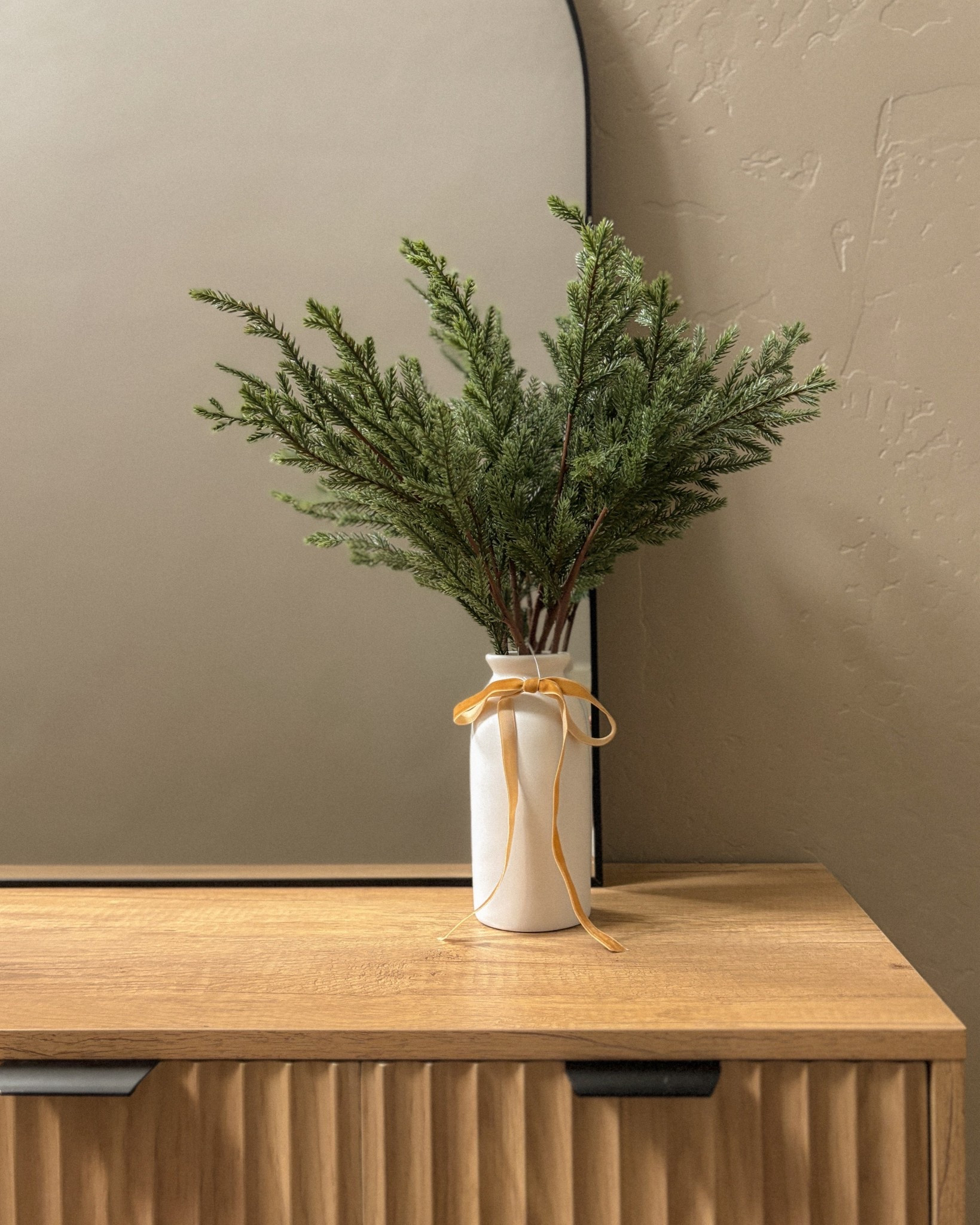 Bring festive vibes to your space with this Draping Pine Arrangement. The lifelike pine in a white vase adds an easy, natural touch to your holiday décor.”

#HolidayDecor #ChristmasVibes #FestiveHome #HomeStyle #PineArrangement #SimpleDecor

#LTKHome #LTKSeasonal #LTKHoliday