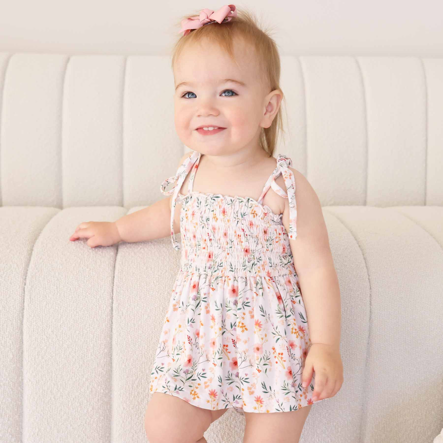 Smocked Twirl Bodysuit | Winnie's Wildflowers | Caden Lane