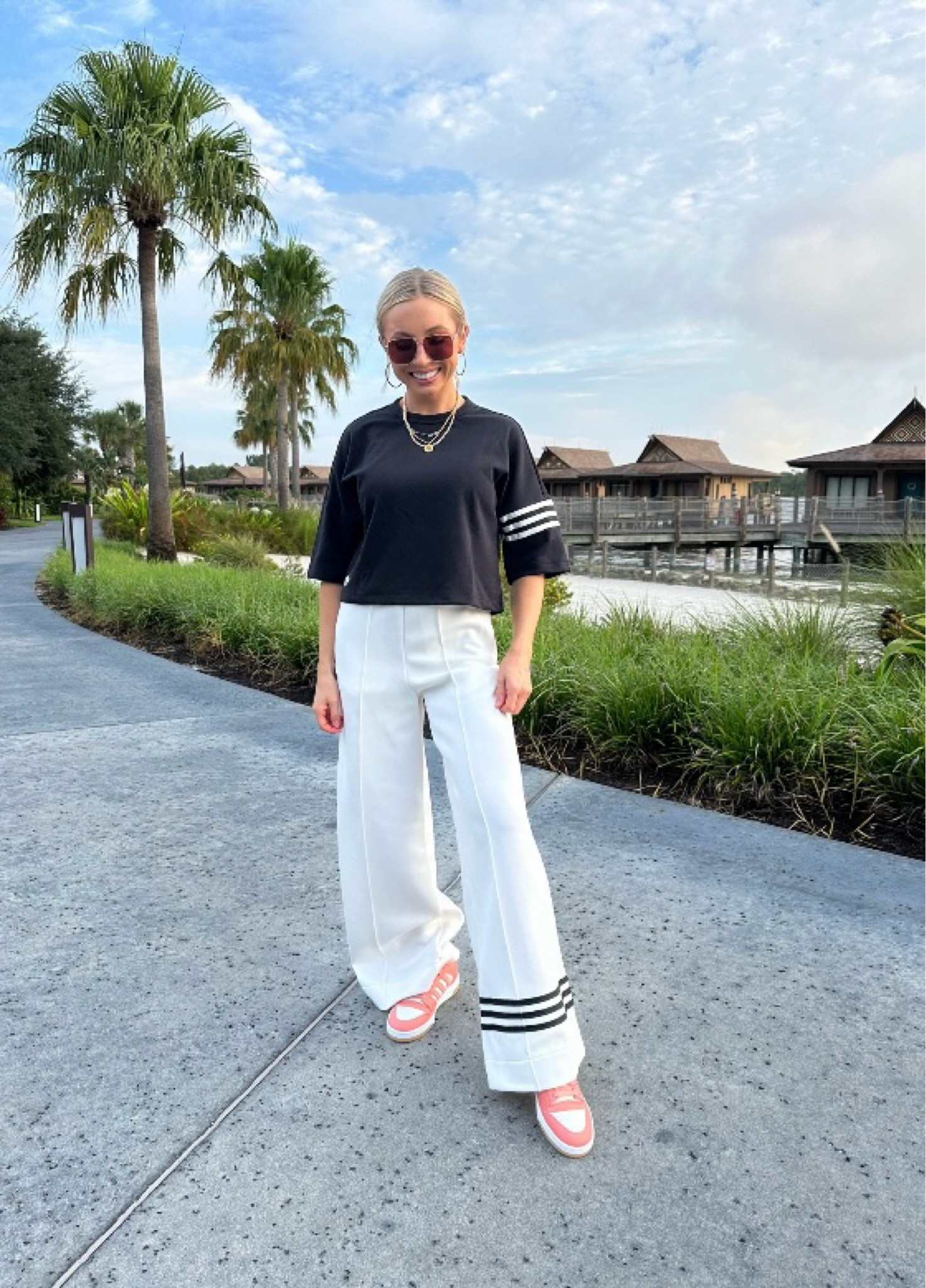 Travel outfit inspo! Use code LTKCON for 30% off my @adidas tee + track pants! Wearing a size XS in both. Both pieces are so versatile. You can literally pop on heels and wear these pants to the office. #adidaspartner #createdwithadidas @adidas 

#LTKstyletip #LTKshoecrush #LTKtravel