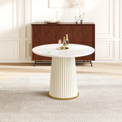 Modern 43.3 Inch Round Dining Table, Glossy Sintered Stone Top with Pleated PU Leather Iron Pedestal, Adjustable Feet for Dining Room & Negotiation Ro | Wayfair North America