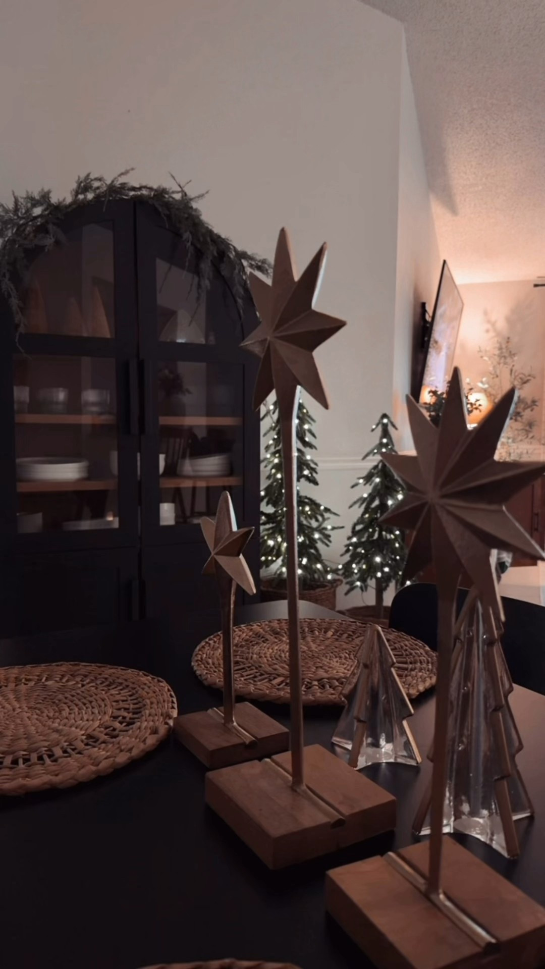 Happy Friday ya’ll . Finally got to decorate my cabinet in the dining room . These are my favorite mini trees and I think they look perfect in this space . What do you think ?? 

#LTKHoliday #LTKSeasonal #LTKGiftGuide