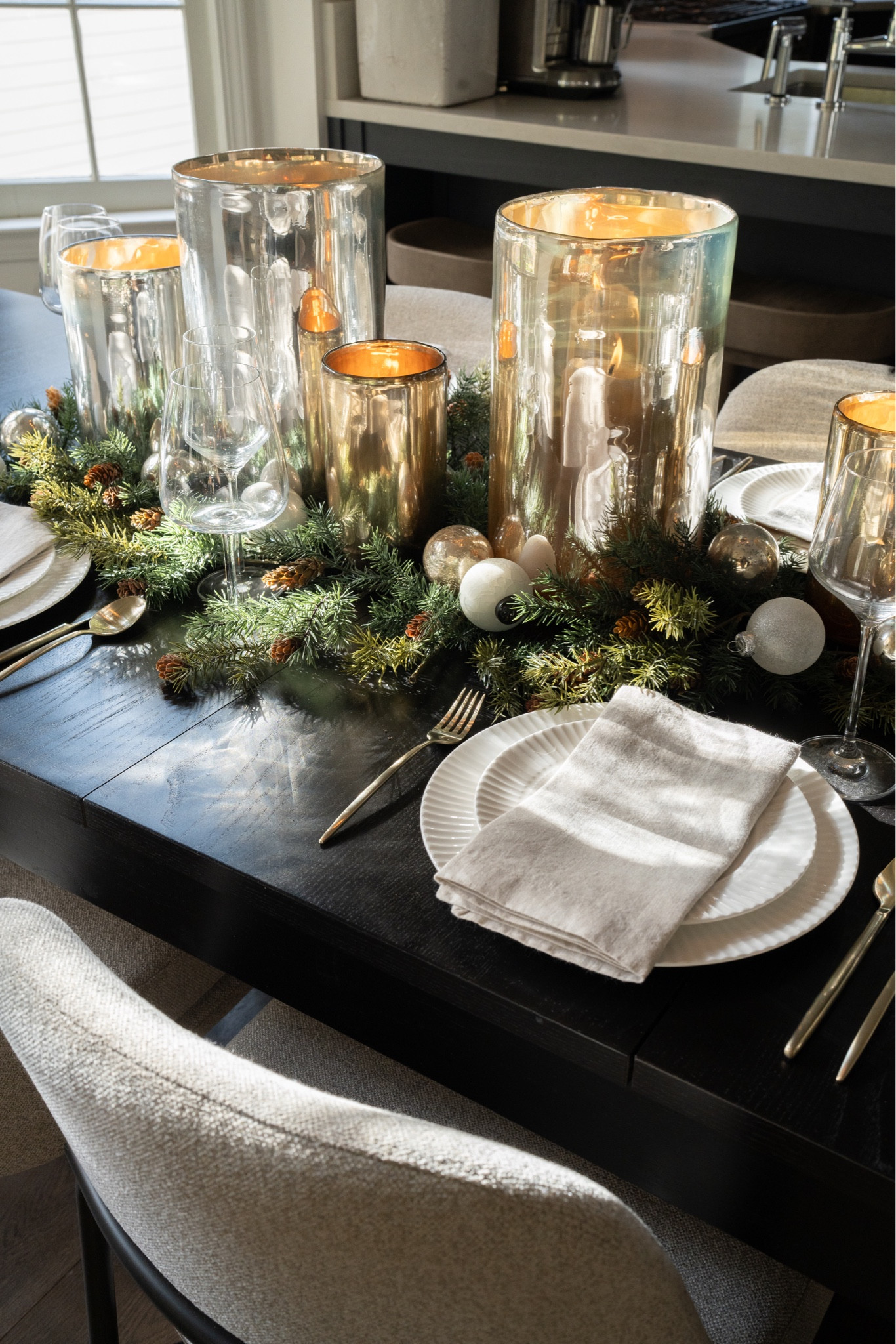 Creating a magical table setting is SO simple & affordable with these stunning finds. 
I start by adding hurricanes down the center of the table. These made in silver and gold mercury glass are modern yet the glow is warm and cozy! 

Next I add greenery- this can be faux or real! Then you could add in mini pumpkins, gourds, and/or ornaments depending on which holiday you are setting for!

Finally, a stunning dinnerware set with fluted edges adds a gorgeous sense of interest, especially when paired with a delicate linen napkin, classic stemware, and brushed champagne flatware! XxV 

#LTKhome #LTKHoliday #LTKSeasonal