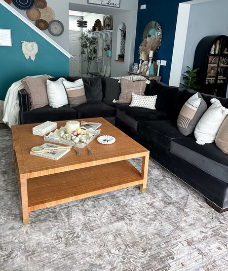 Loving room, neutral with rattan light wood accents. Modern Bohemian design. Looking for a new neutral large rug that pops a little more. #boho #modernboho #cozyhome #livingroom #homedecor #cozyspaces #sectional #pillowcovers #rattancoffeetable #neutrallivingroom #coffeetabledecor #designbook #marblebowk #decoraccents #tabledecor #scandiboho 

#LTKStyleTip #LTKHome #LTKSeasonal