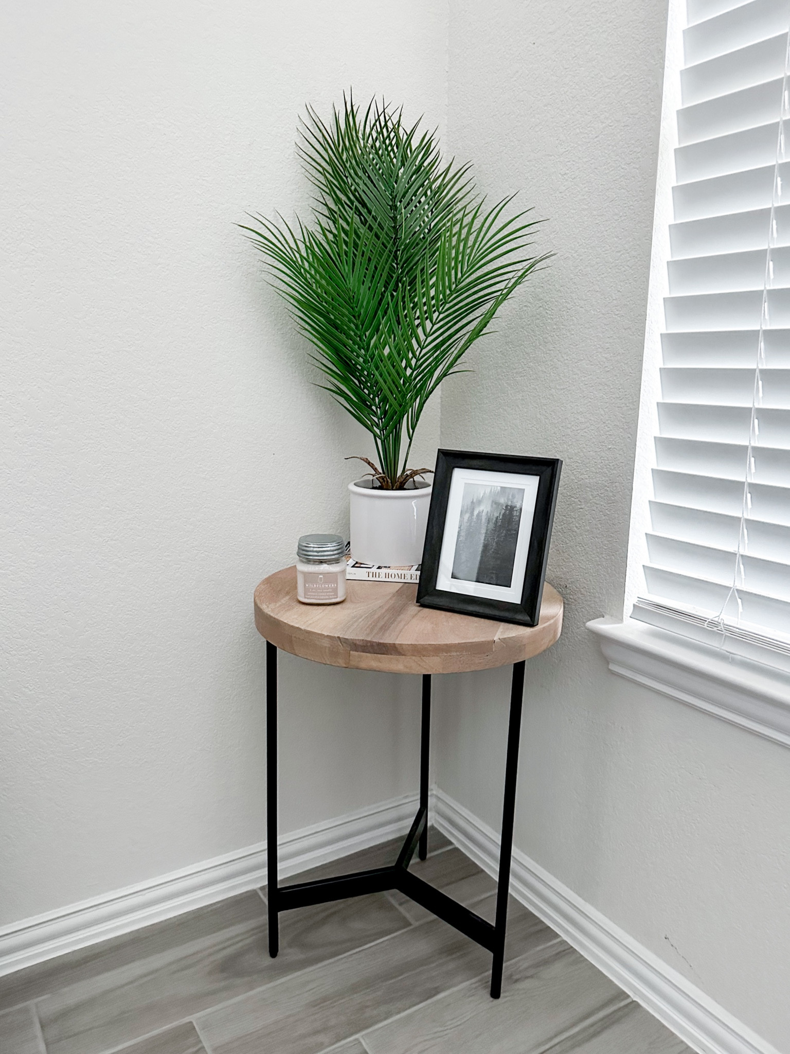 Spiced up my living room stand. Moved it to this corner instead of at the end of my couch and I’m loving it. Just need to add a photo to the frame. #homedecor #decor 

#LTKhome #LTKFind