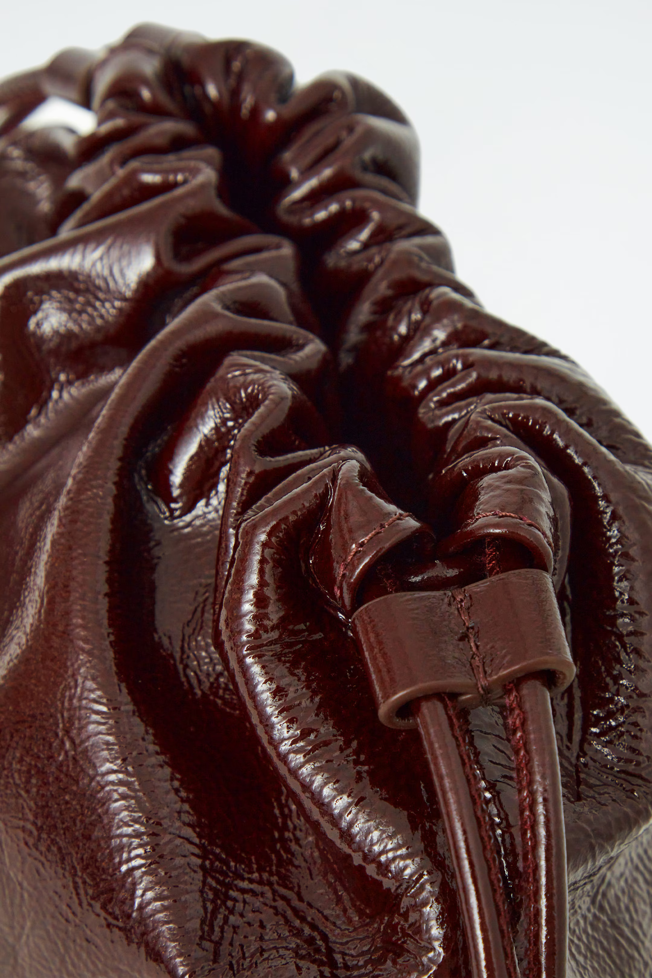 MINI CAVATELLI CLUTCH BAG - LEATHER - BORDEAUX | COS | COS UK