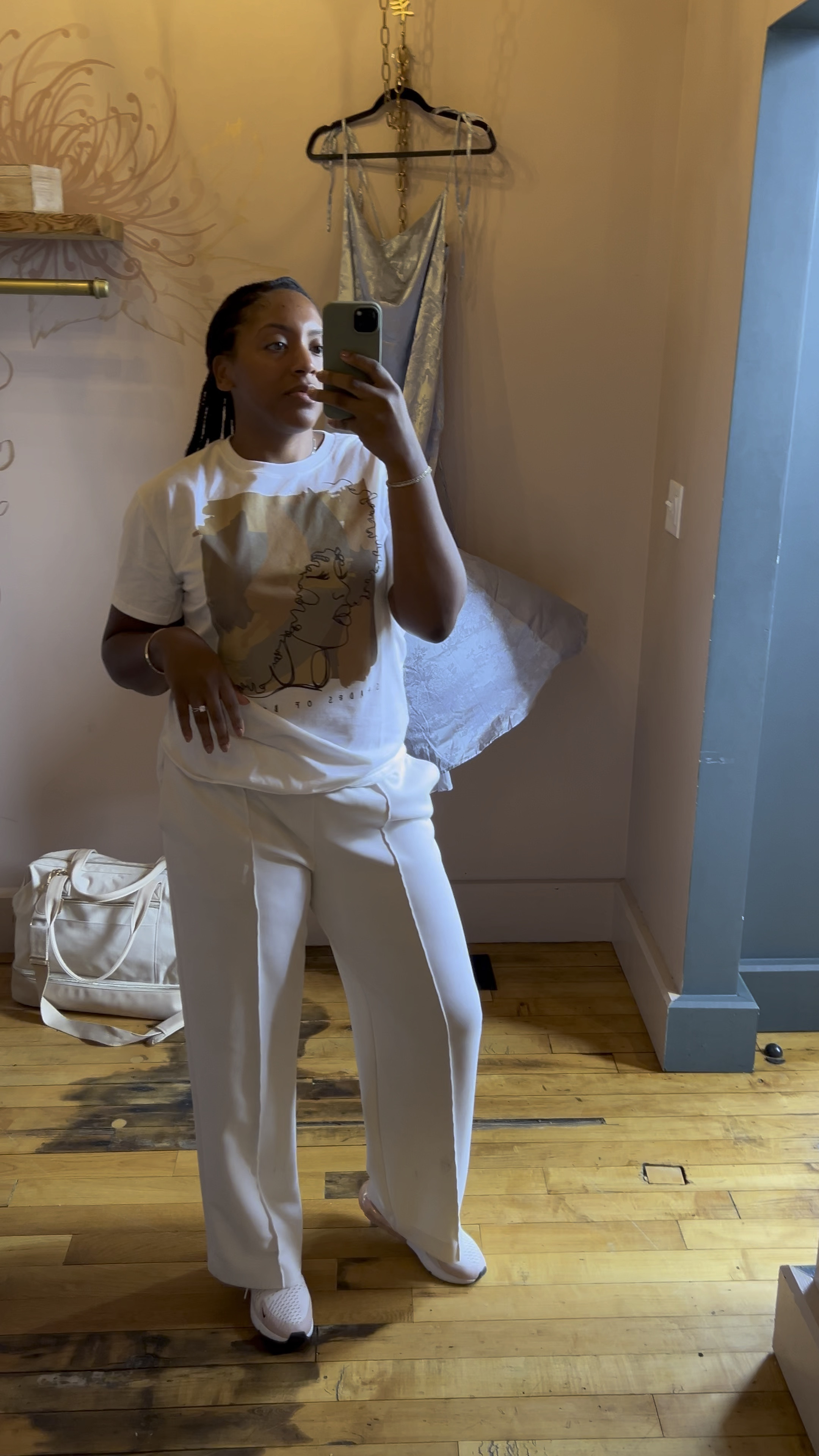 Comfortable on the go look. Target absolutely killed this graphic tee! These are my absolute favorite pants! They feel my pajamas, I also have them in black. 

#LTKFallSale #LTKTravel #LTKFindsUnder50