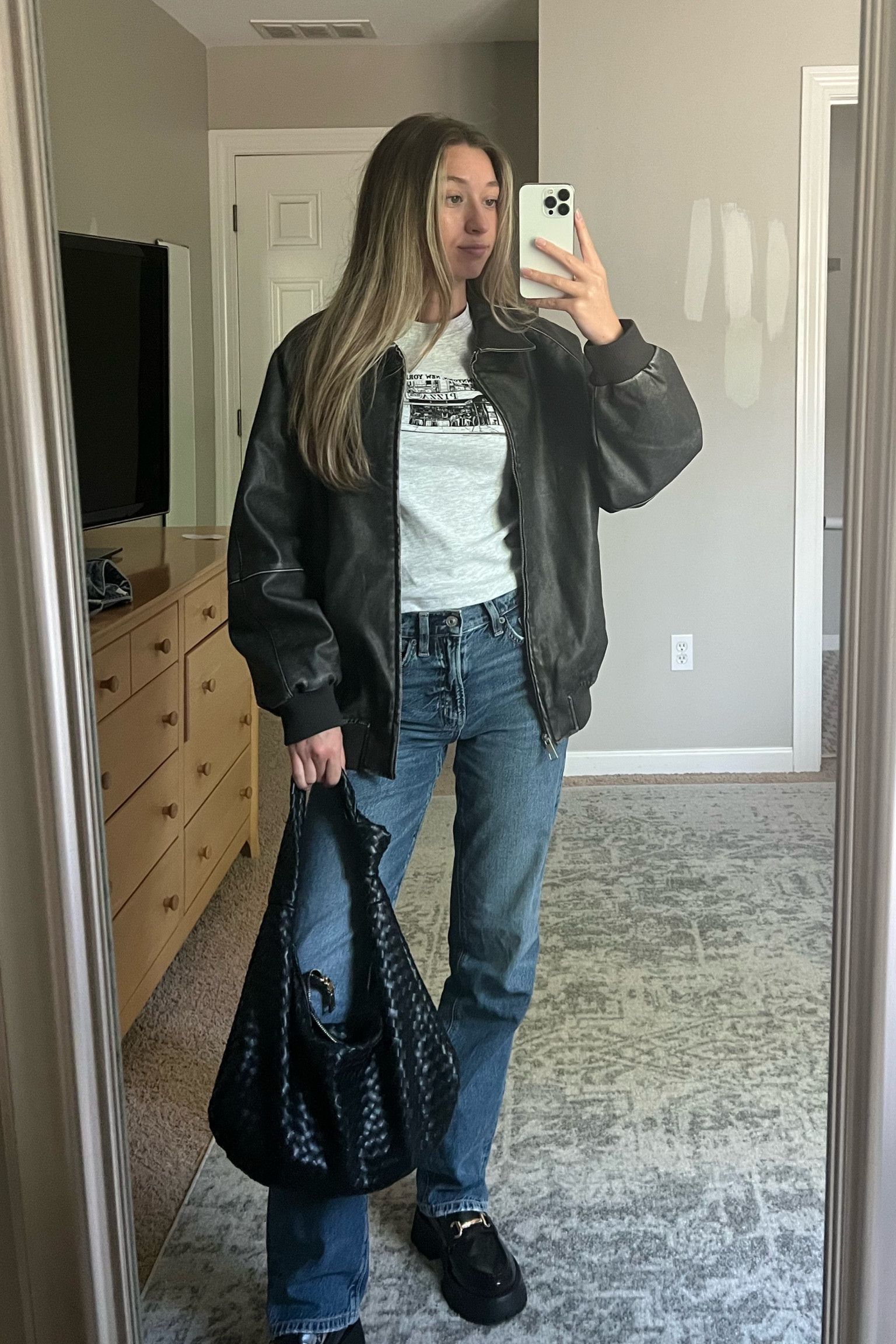 dark wash jeans, low rise jeans, loafers, black leather jacket, bottega dupe bag, black purse, graphic tee shirt

#LTKSale #LTKsalealert #LTKstyletip