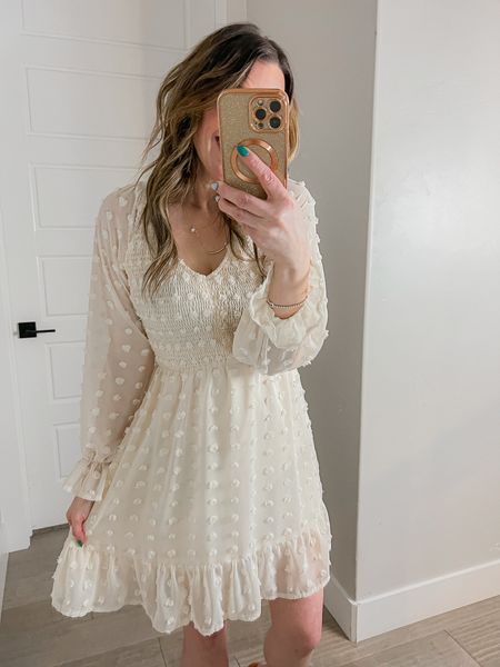 Say hello to your new go-to dress for any occasion! 🌼👗 Whether you're dressing up for a wedding or heading out for brunch with the girls, this cute dress found on Amazon has got you covered. Flattering for any body type, this cream-colored dress is not only modest but also comfortable and stylish. Perfect for Easter, Mother's Day, or a beach vacation. It hits at the knee and has a lovely texture that adds a touch of sophistication. Wearing in size S and true to size, you'll feel amazing in this dress, no matter the occasion. Shop now and get ready to stun the crowd. #AmazonFashion #modestfashion #flatteringstyle #perfectfit #versatilestyle #texture #cutedress #summerstyle 

#LTKwedding #LTKunder50 #LTKstyletip