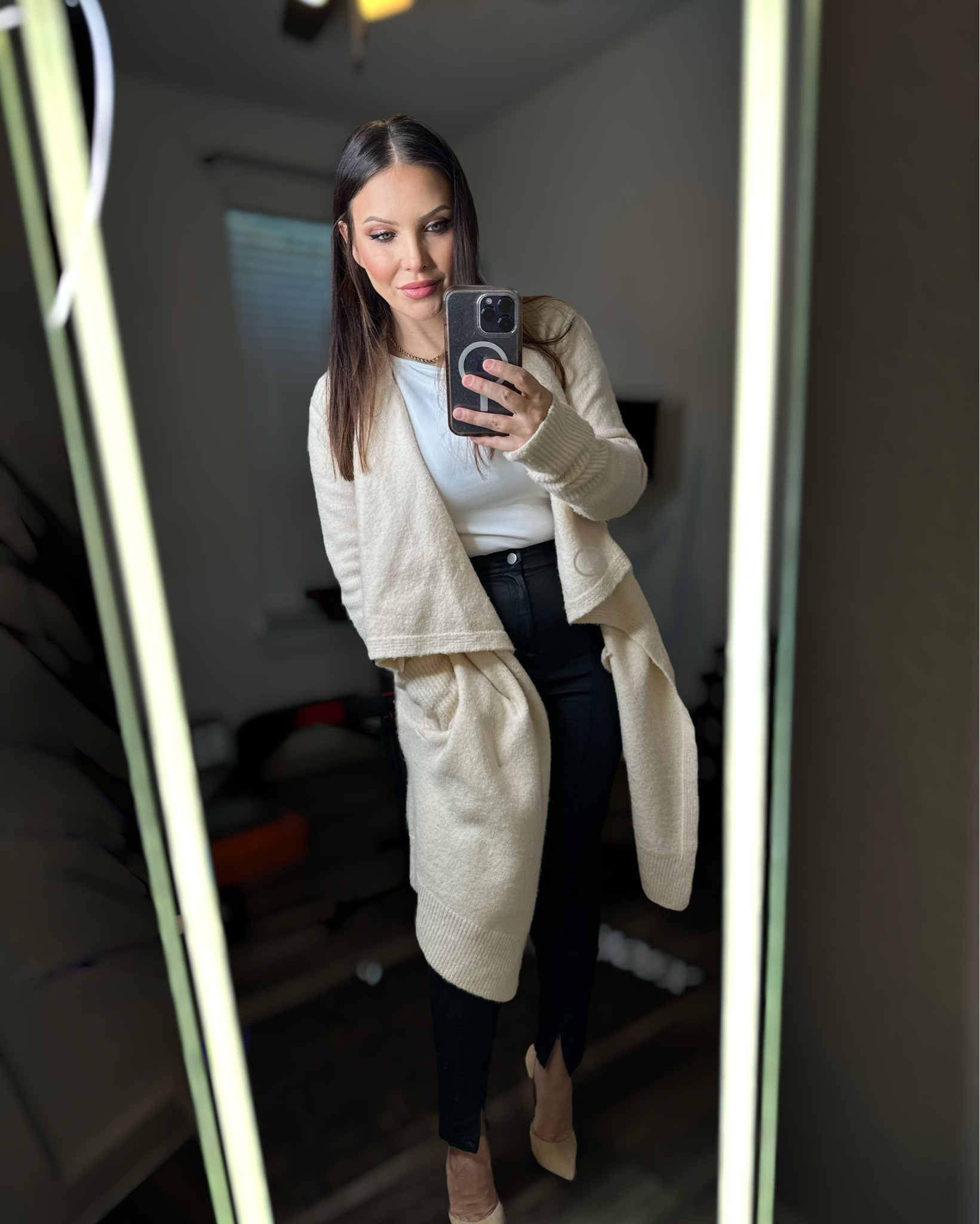 First Sunday of the New Year and of course the cold front finally hits us. This is waterfall sweater from Vici Collection has pockets and it pairs so well with these black skinnies and my favorite neutral pumps
I’m wearing a small in everything linked below
For reference I’m 5’ ish and 135lbs

#LTKWorkwear #LTKFindsUnder50 #LTKSeasonal