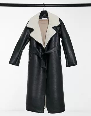 ASOS DESIGN belted longline leather look coat in black and cream | ASOS (Global)