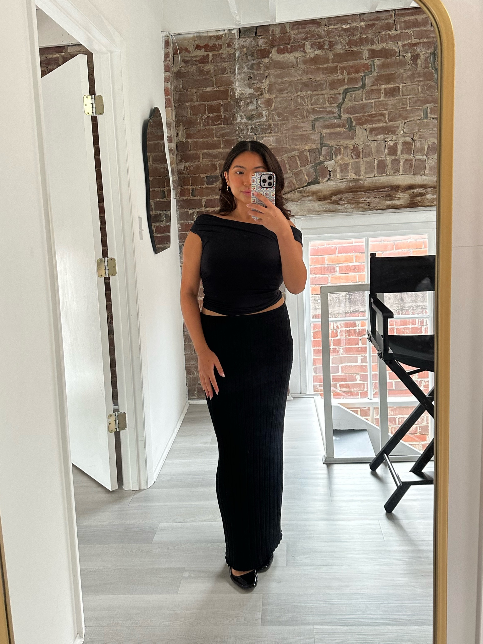 All black work to going out outfit

Off shoulder black ruched top
Black ribbed maxi skirt
Square toe patent ballet flats with strap 

Top princess polly
Skirt sndys 
Shoes tillys 

#LTKSeasonal #LTKworkwear #LTKstyletip