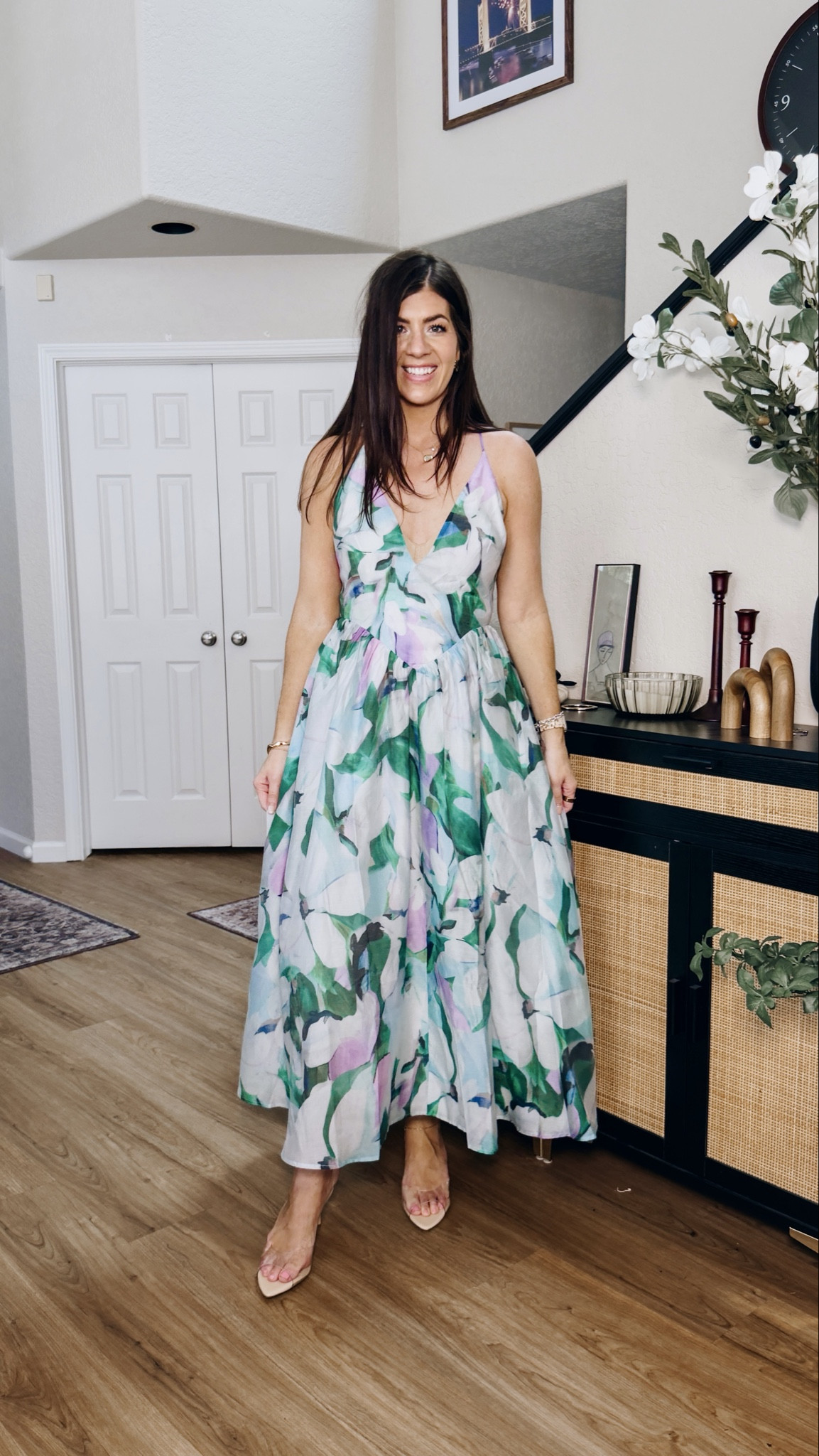 In an 8 floral tie back dress 

#LTKWedding #LTKMidsize #LTKTall