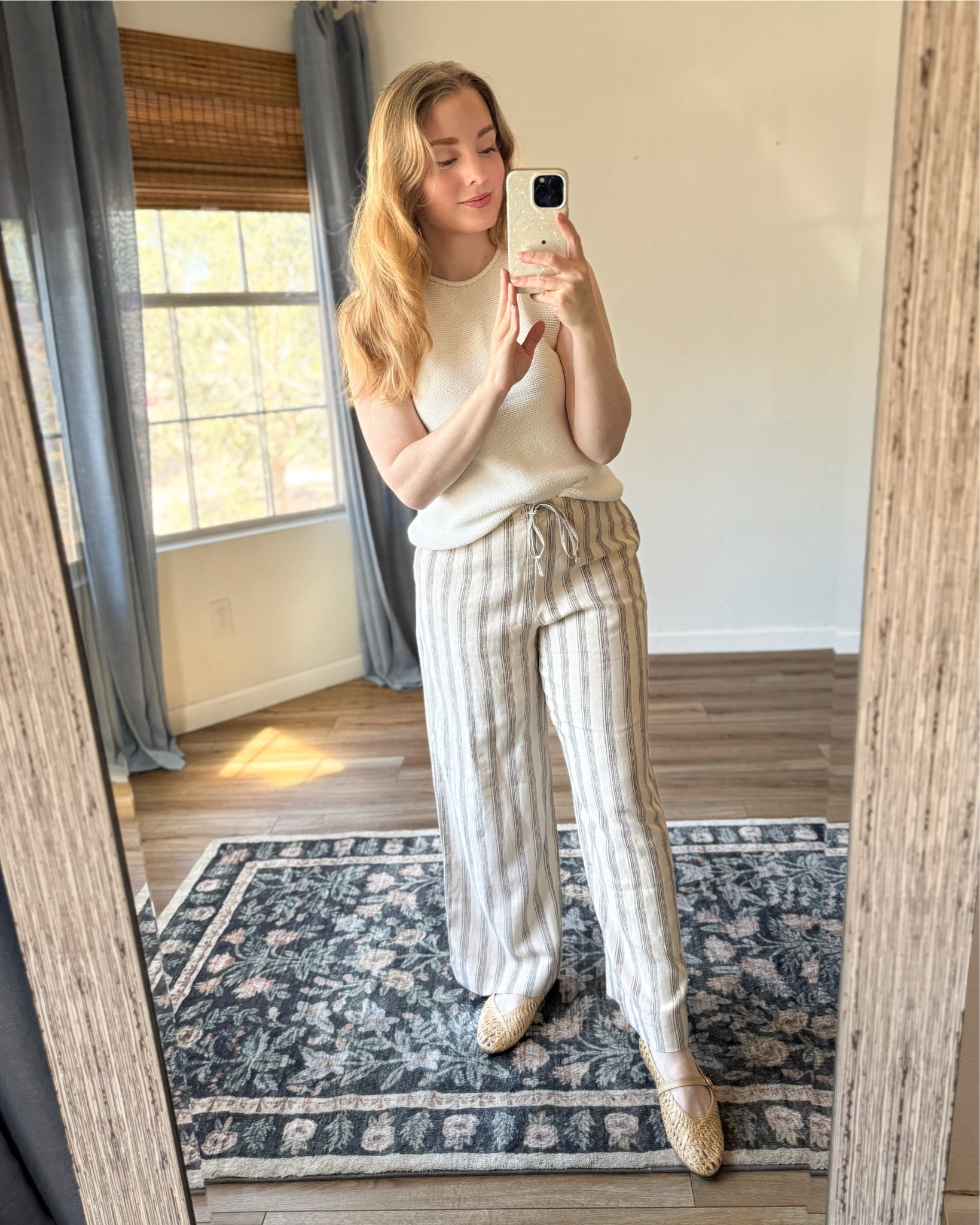 @abercrombie spring outfit ideas! striped linen pants with sleeveless sweater, floral print matching skirt set, strawberry print gingham dress, low rise loose fit jeans (not super low rise, and i love the fit!), striped loungewear 

wearing my normal small/26short in everything. i feel like everything runs pretty tts. 

#LTKsalealert #LTKtravel #LTKSeasonal