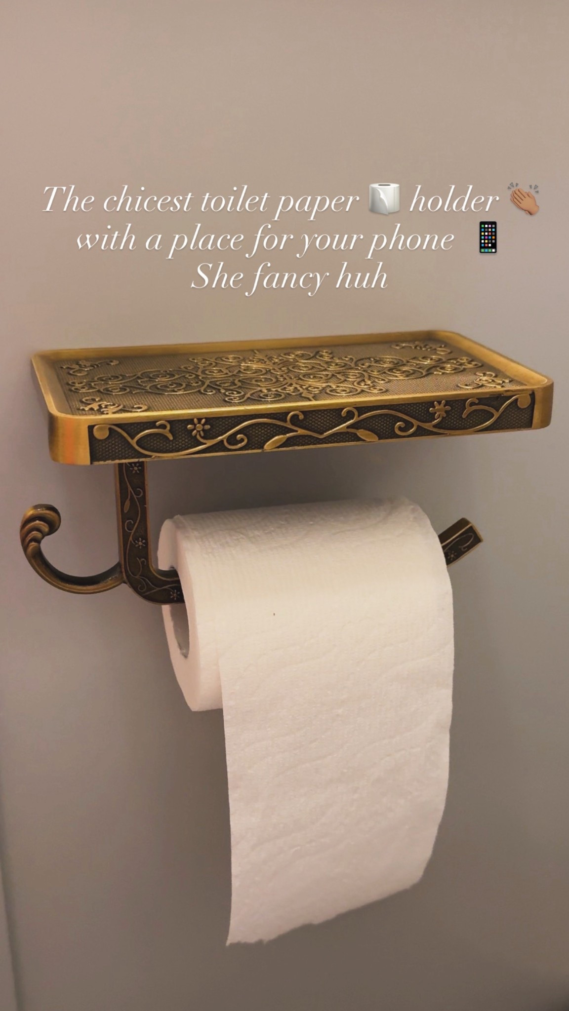 The chicest toilet paper and phone holder from the bathroom 