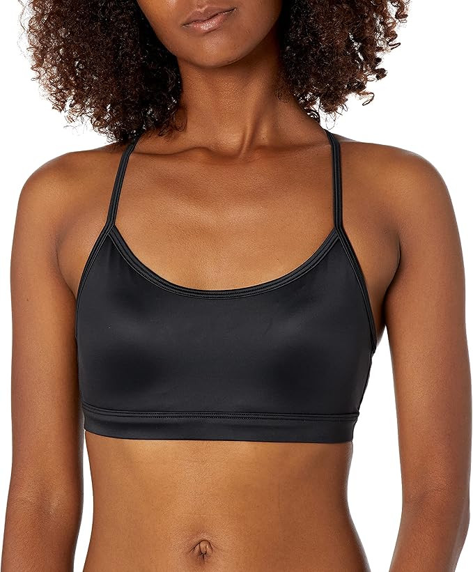 Core 10 by Reebok Women's Strappy Shiny Light Support Sports Bra | Amazon (US)