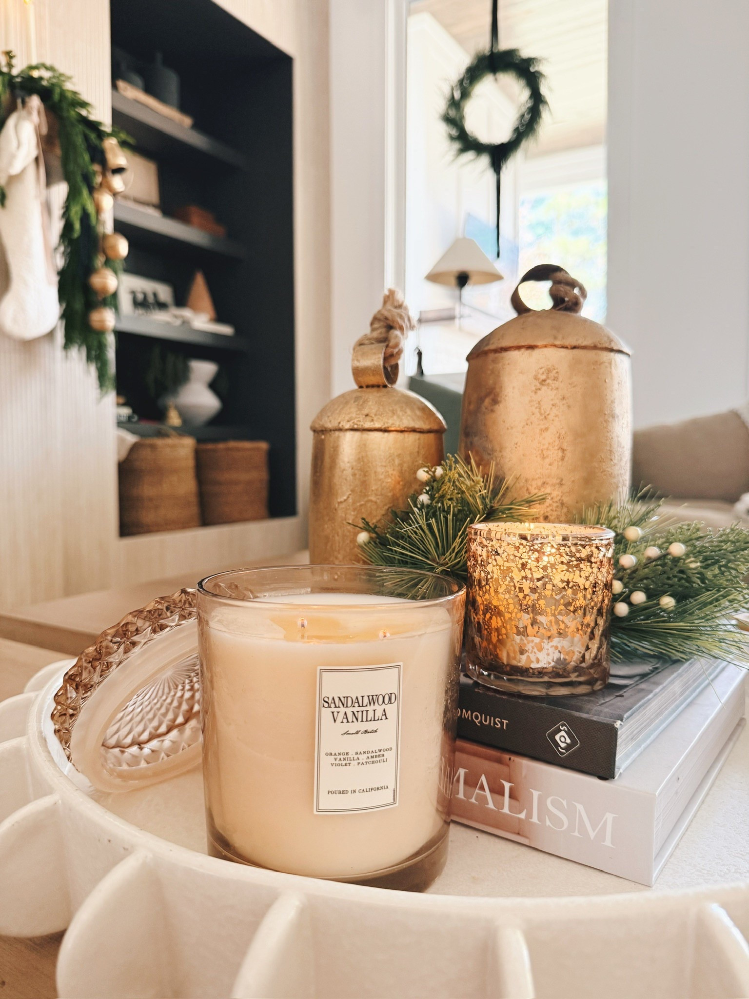 Cozy moments by candlelight ✨ The perfect mix of sandalwood vanilla, soft golds, and greenery to bring that calm, festive glow home this season. Style your coffee table with layers of warmth — candles, bells, and books always do the trick 🤍

Shop my favorite candles, trays, and holiday accents here!
#porcheandco #coffeetablestyling #holidayhome #neutralchristmasdecor #modernclassicstyle #homedecorfinds

Need even more styling or interior design help inside your home?! Visit our Online Interior Design Studio and one of our designers would love to help! Secure your packages today 🏡 —> https://porcheandco.com/edesign

#LTKHoliday #LTKSeasonal #LTKHome