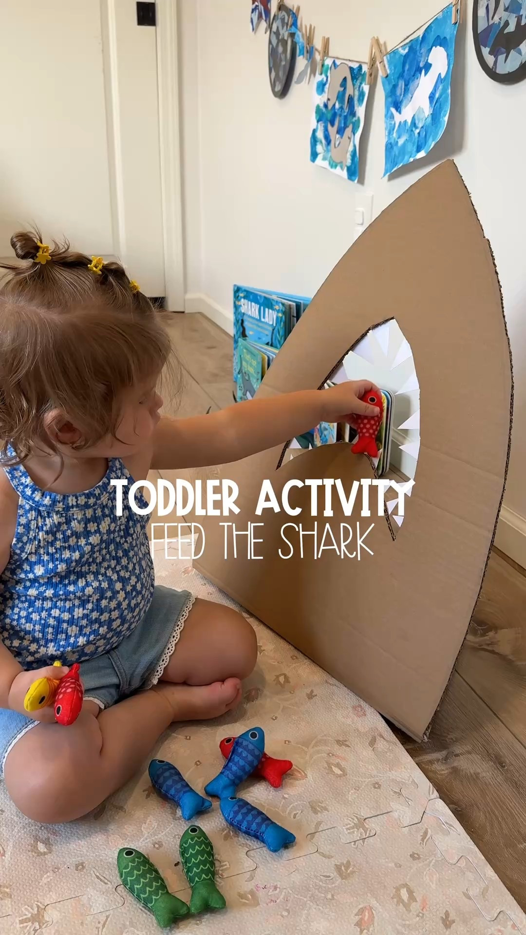 Toddler Activity: Feed the Shark 🦈 🐠✨

Apparently fish are food and not friends over here 😅 John made Macy the best cardboard  shark for her to play with for shark week! 

He used one of our endless cardboard boxes, cut out a shark shape, laminated a white sheet of paper, and added some sharp (but safe!) paper teeth. 🦷

I paired it with our @Hahaland fish toys, and Macy was so into it—kept her busy for a good chunk of time this the morning! You could totally make your own fish out of paper or cardboard, or even use ball pit balls for a quick and easy option.

Make it a game by asking your little one to feed the shark by color or count for an added learning twist! 🎣

We finished off with a few of our favorite shark-themed books—such a fun and easy way to celebrate Shark Week with toddlers! 💙🌊

#sharkweek #cardboardcrafts #toddleractivities #creativekids #diyforkids  #toddlertoys #creatorsearchinsights #CapCut 

#LTKFamily #LTKSeasonal #LTKKids