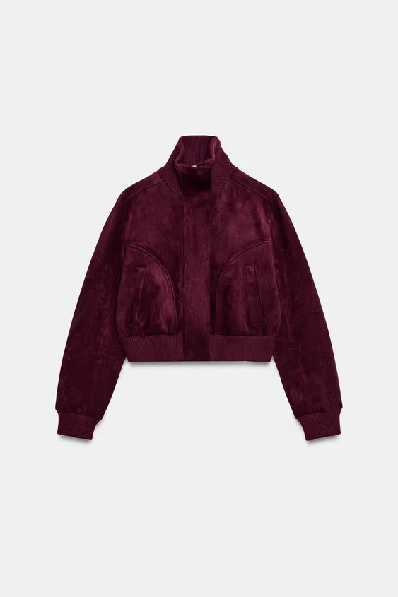 High-neck jacket with long sleeves and cuffs. Front welt pockets. Front closure with zipper and c... | Zara US