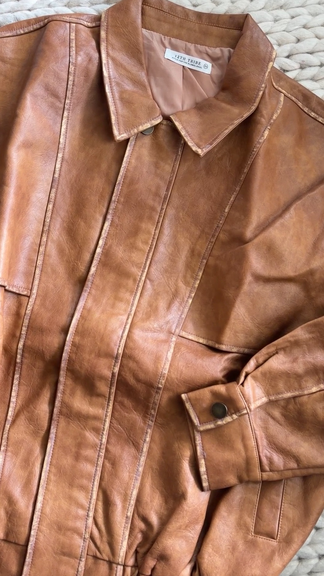 The London Calling Cognac Oversized Faux Leather Jacket from 12th Tribe is giving everything. That cognac color, the distressed edges, the elastic hem detail. It looks so much more expensive than it is. I am so in love with this one. Runs oversized so I went with XS. Linked in my LTK! @12th Tribe 

faux leather jacket - cognac jacket - leather bomber - oversized jacket - 12th tribe - 12th tribe jacket - fall jacket - winter jacket - leather jacket outfit - cognac leather - bomber jacket - vintage inspired jacket - distressed leather - faux leather - affordable leather jacket - street style jacket - casual chic - effortless style - fall fashion - transitional jacket - layering piece - outfit of the day - fall outfit - everyday style - womens jacket - closet staples - elevated basics - casual outfit - fashion finds & style inspo​​​​​​​​​​​​​​​​

#LTKvlog #LTKFestival #LTKootd