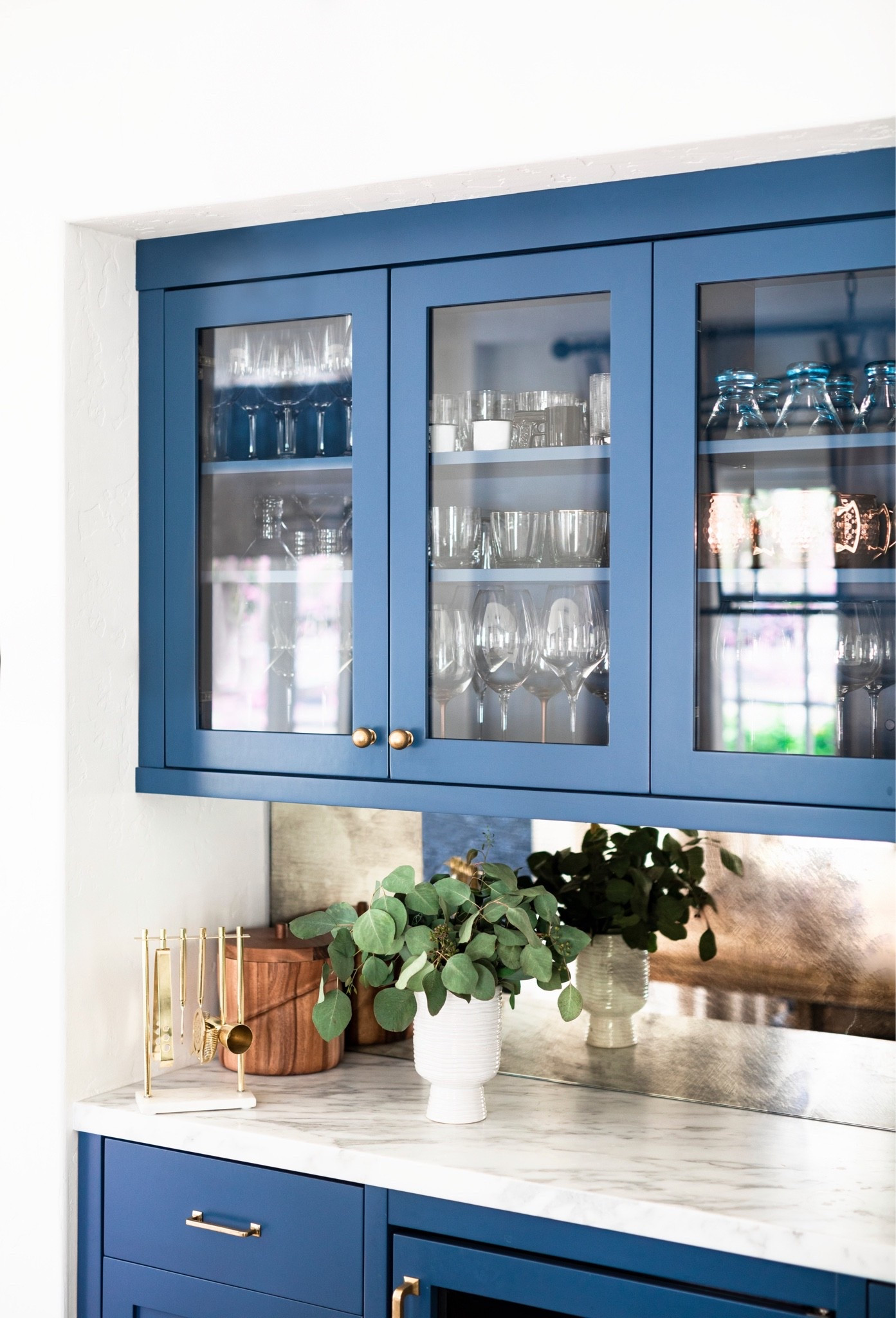 Moody home bar styling with warm wood tones, glassware, and elevated decor details for the perfect entertaining space. Home bar inspo, modern home bar, luxury interiors, cocktail corner styling, bar cart decor, and entertaining at home ideas

#LTKhome #LTKluxury #LTKsummer