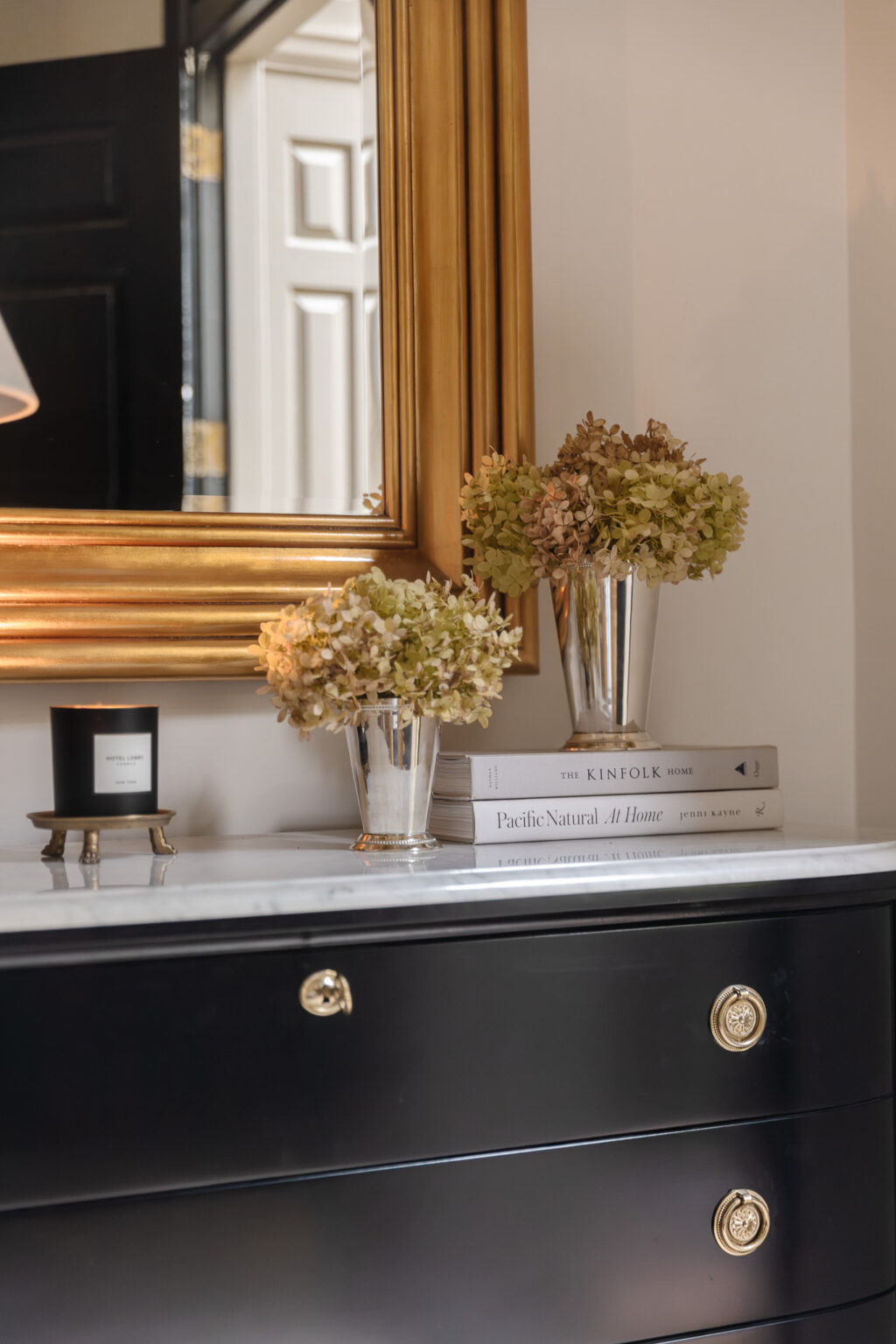 Silver is trending this season, but it has to be polished (not matte or brushed). I got these polished silver vases from Wayfair and just love how they look layered with the gold/brass elements in our entry. Linked them and a bunch of other silver finds if you're wanting to incorporate this fall trend in your home. @wayfair #wayfair and #wayfairpartner 

 #LTKHome #LTKFindsUnder50 #LTKStyleTip