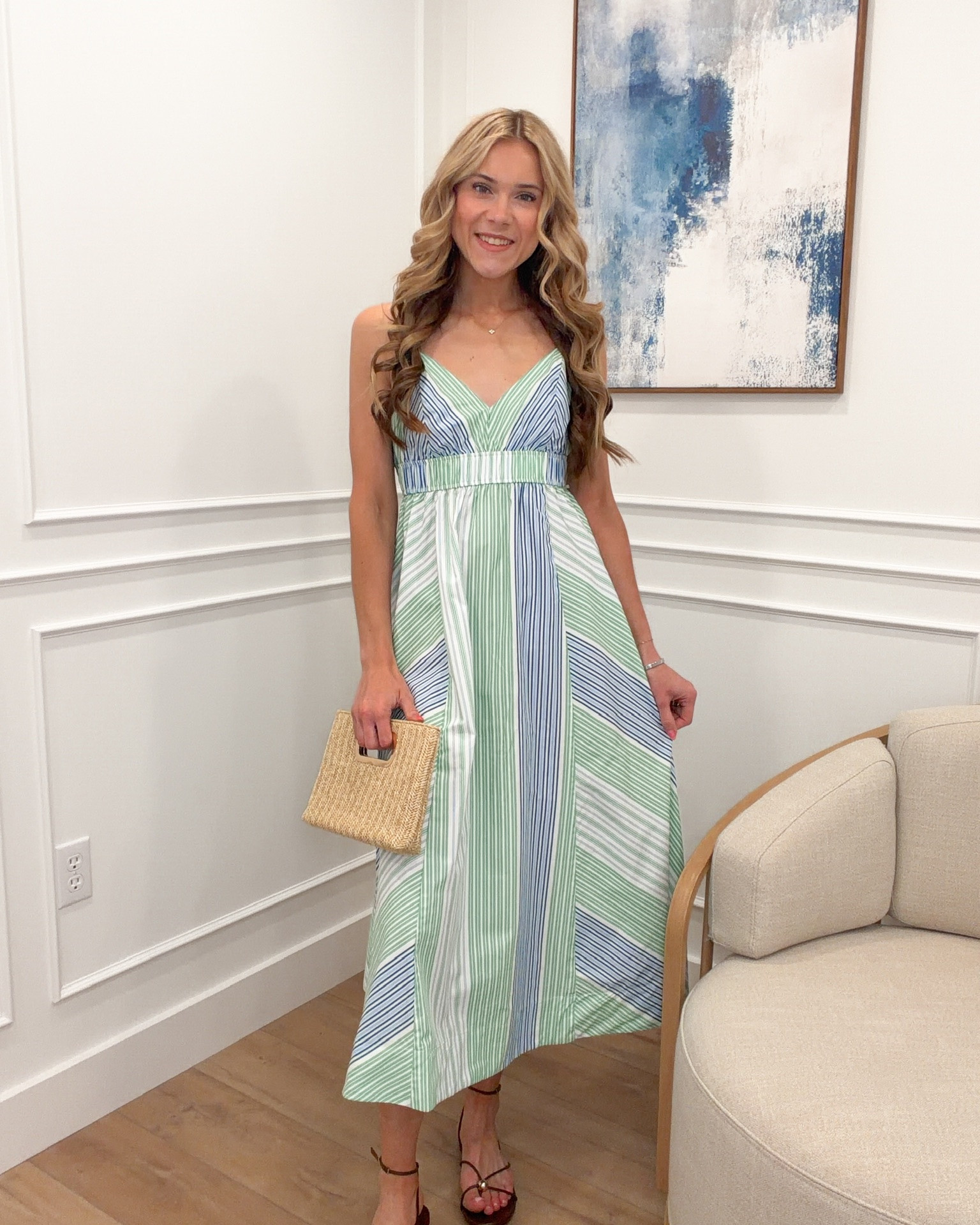 This multi stripe Walmart midi dress is one of the most beautiful vacation pieces I have found this summer and I need everyone to have her 🌿💙✨ The diagonal stripe paneling is so stunning and the empire waist is incredibly flattering. Wearing a small — I am 5’9 and the midi length is absolutely perfect. Paired with a woven clutch and cognac heels for the most effortless resort look. Linked for you!

#LTKootd #LTKSeasonal #LTKWedding