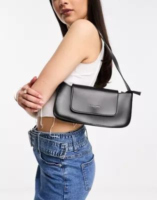 Claudia Canova baguette shoulder bag with flap top detail in black | ASOS (Global)