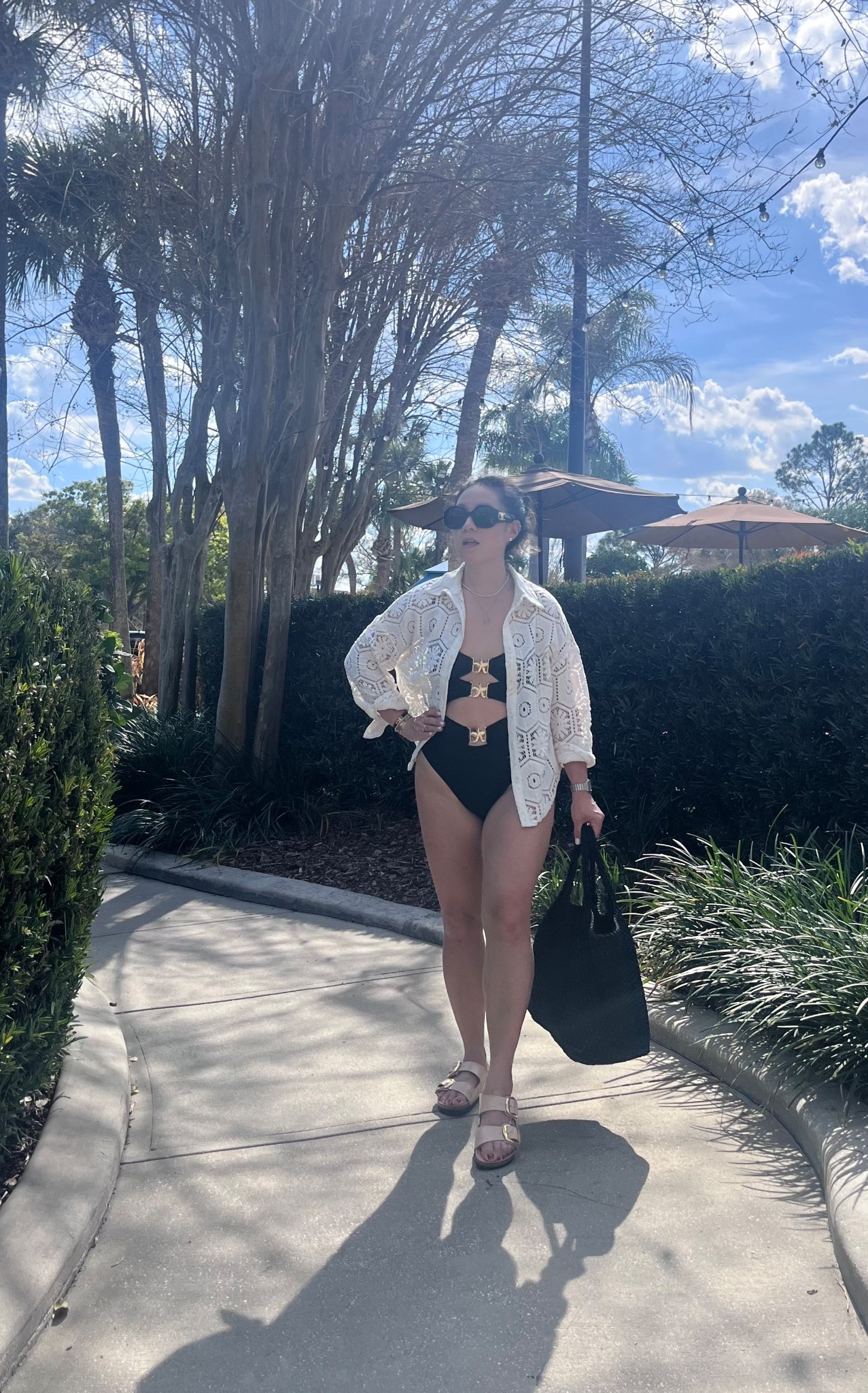 Sunny days. The crochet shirt I’m wearing comes as a set, so it’s a steal of a deal! Multiple outfits. Swim suit is a one piece. I’m wearing an xs in everything. Straps are adjustable, which is so clutch. The bag is the large size. It’s the best travel bag IMO. I take it as a carryon and then use it as a beach bag. The handles stretch with you, so yes, it will fit on your shoulder.

#LTKTravel #LTKdayinmylife #LTKootd