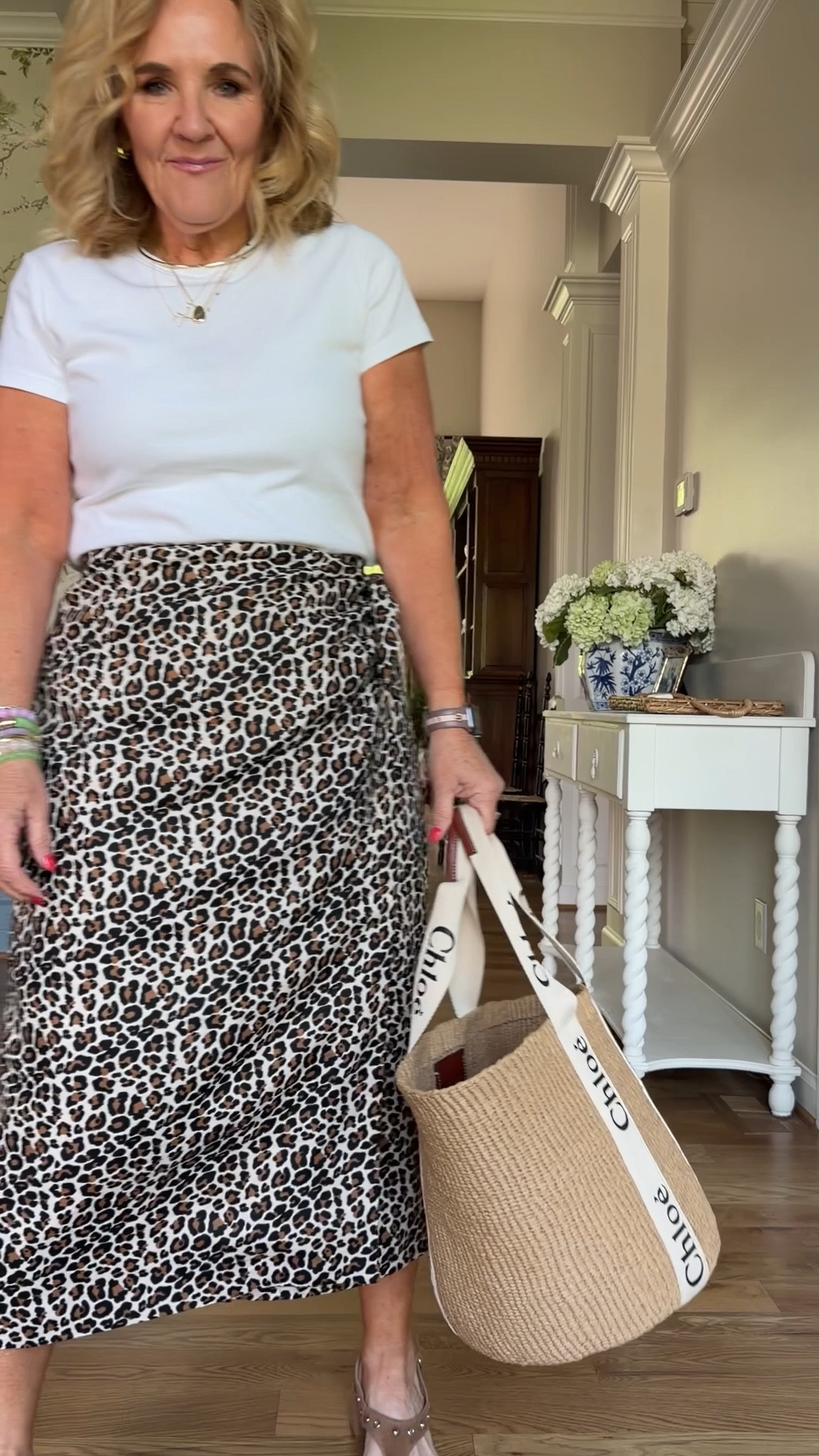 White tee size small 
Linen wrap skirt lined 8 petite 15% off on the website 
20% off my bracelets code NANETTE20
#LTKOver40 #LTKWorkwear #LTKPetite