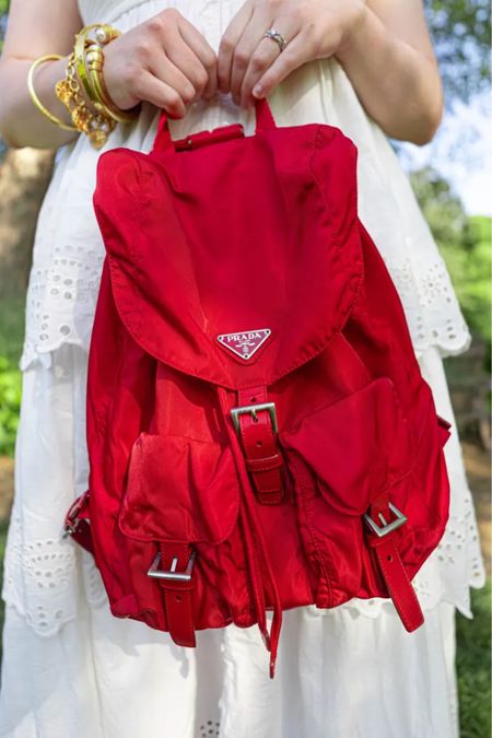 A bright pop of red for summer with this Prada nylon backpack, perfect for summer adventures and travel, festivals, and more! #patriotic #luxurystyle #eyeletdress #whitedress #whitemaxi 

#LTKstyletip #LTKSeasonal #LTKitbag