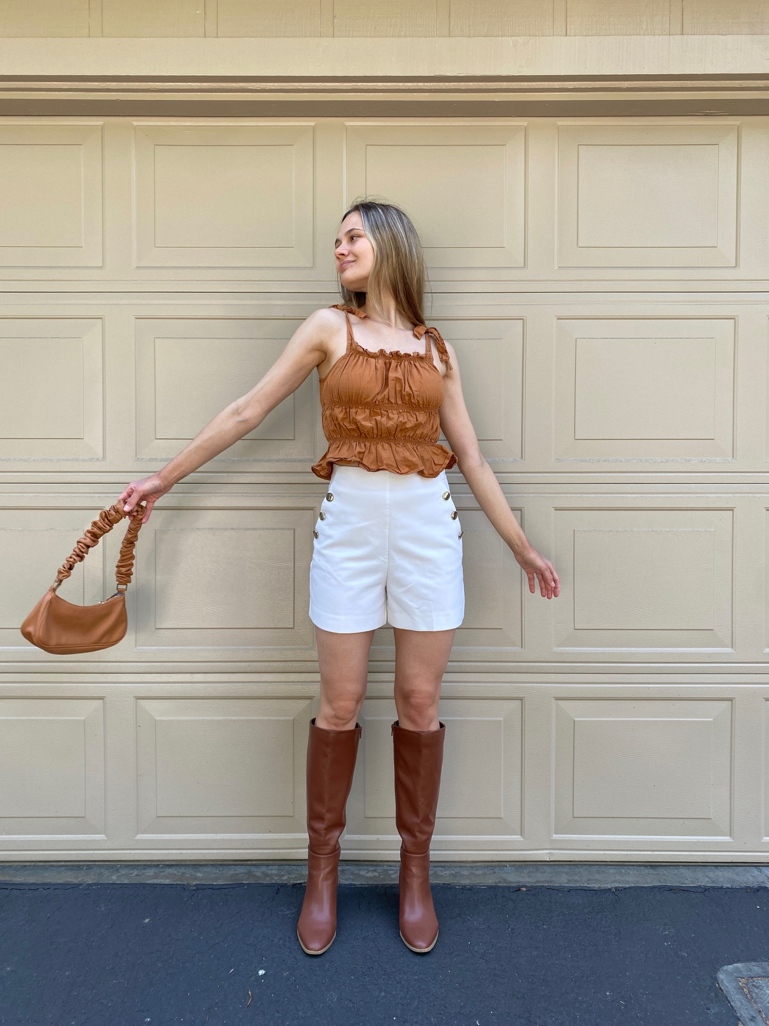 This neutral outfit is perfect for the summer. The knee boots and the high-rise pants go so well together. The white pants make a nice contrast to the brown boots, top, and bag. Btw: the boots & the bag are Target finds!
I’m OBSESSED with the boots, but they’re currently only available in a slightly different color & material 

Knee boots, shorts, summer style, spring to summer transition, spring outfits, summer outfit, summer fashion trends, Target, trendy looks, neutral style

#LTKstyletip #LTKFind #LTKshoecrush