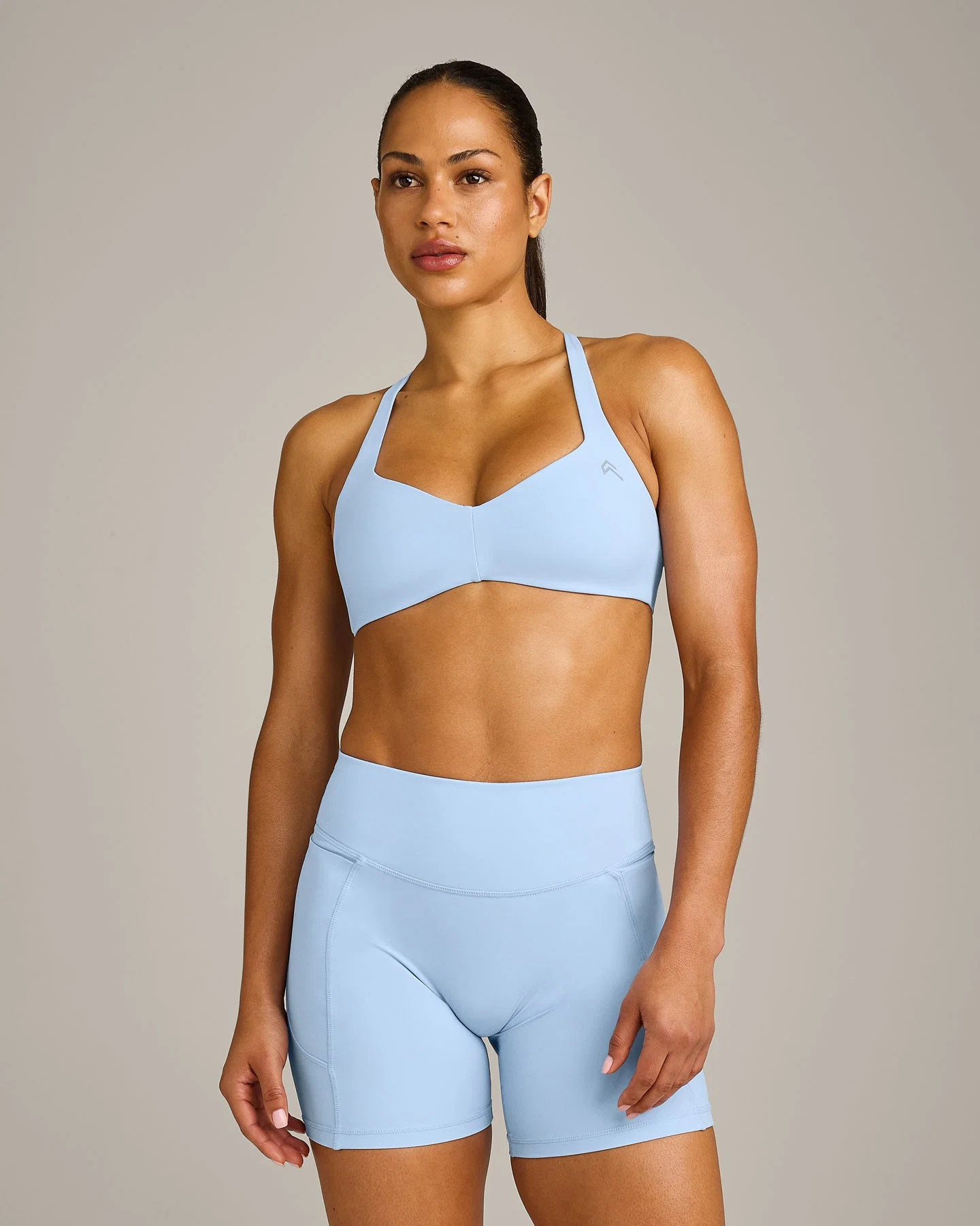 UnifiedMove\u2122 T Back Minimal Bralette with Reflective Logo
Powdered Blue | Oner Active (UK / US)