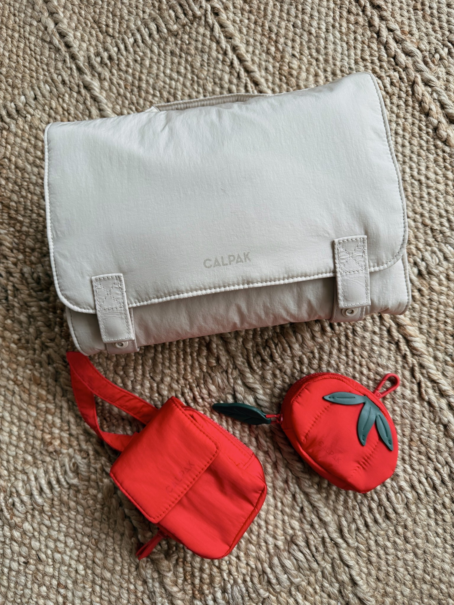 #ad Spring has sprung and I’m really looking forward to more adventures to the park, pool and road trips up north. Thankfully @calpak has us covered with some must-have accessories from their new baby collection. 

The diaper changing pad organizer is super handy to keep in your car, stroller or diaper bag. It has multiple pockets to store all the necessary diaper changing items and a wipeable changing pad. I’m also a big fan of their pacifier pouch that easily snaps to my diaper bag. I keep multiple pacifiers in here for Quinn! The tomato pouch has also been really nice for quickly getting hand sanitizer or my lip balm. I can clip this to the outside of my diaper bag or just throw it inside my bag. 

#LTKKids #LTKBaby #LTKTravel