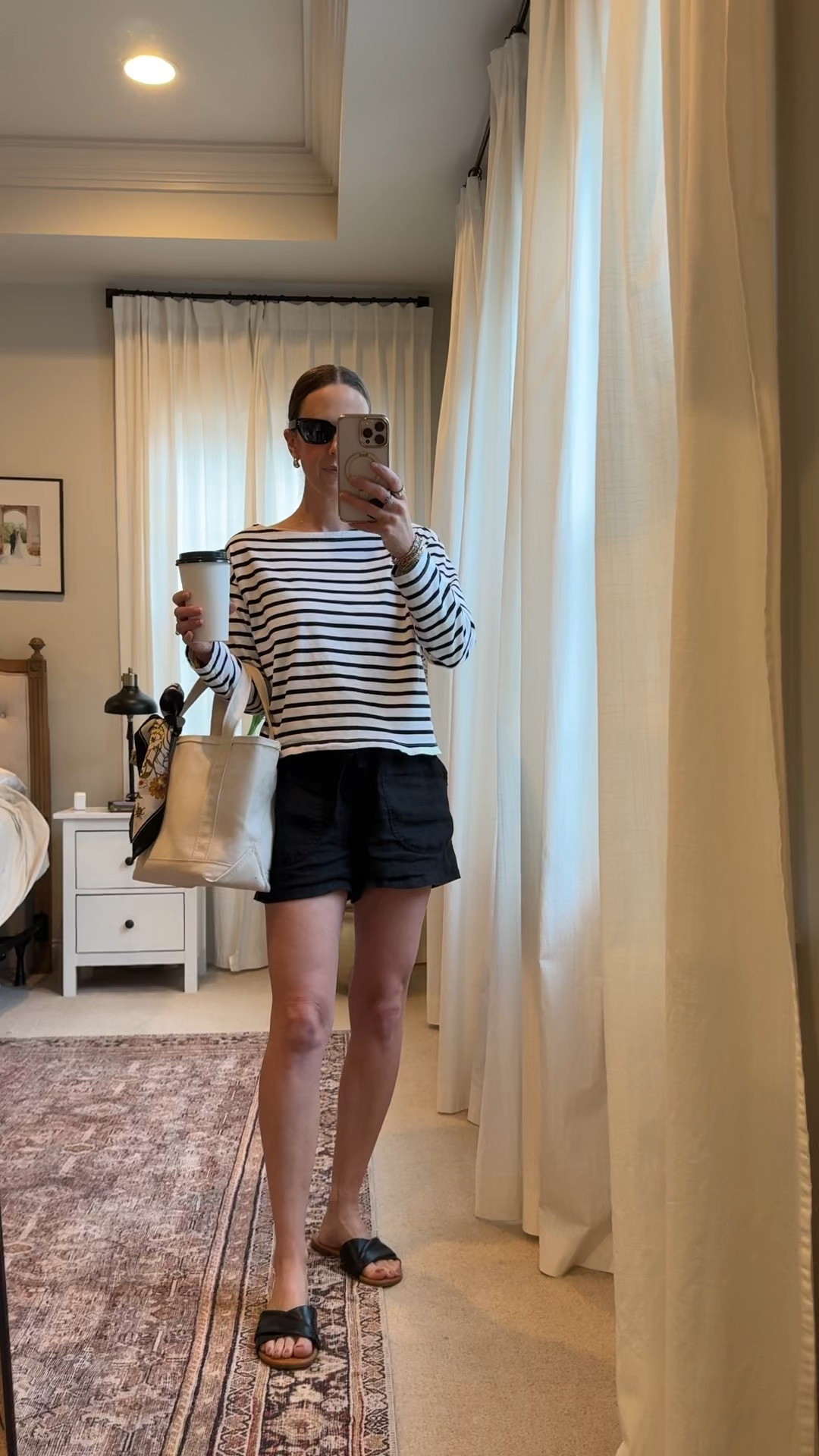 Casual mom chic = my go-to summer capsule outfit 🤍 Quince linen shorts (wearing size S) are so comfy but still look polished (easy coastal / classic vibe). Paired with a striped top + simple black slide sandals for an effortless everyday mom outfit / vacation outfit / weekend outfit.

Quince code: INFG-26LINENANDLIGHTCO10

#LTKootd #LTKmomlife #LTKSeasonal