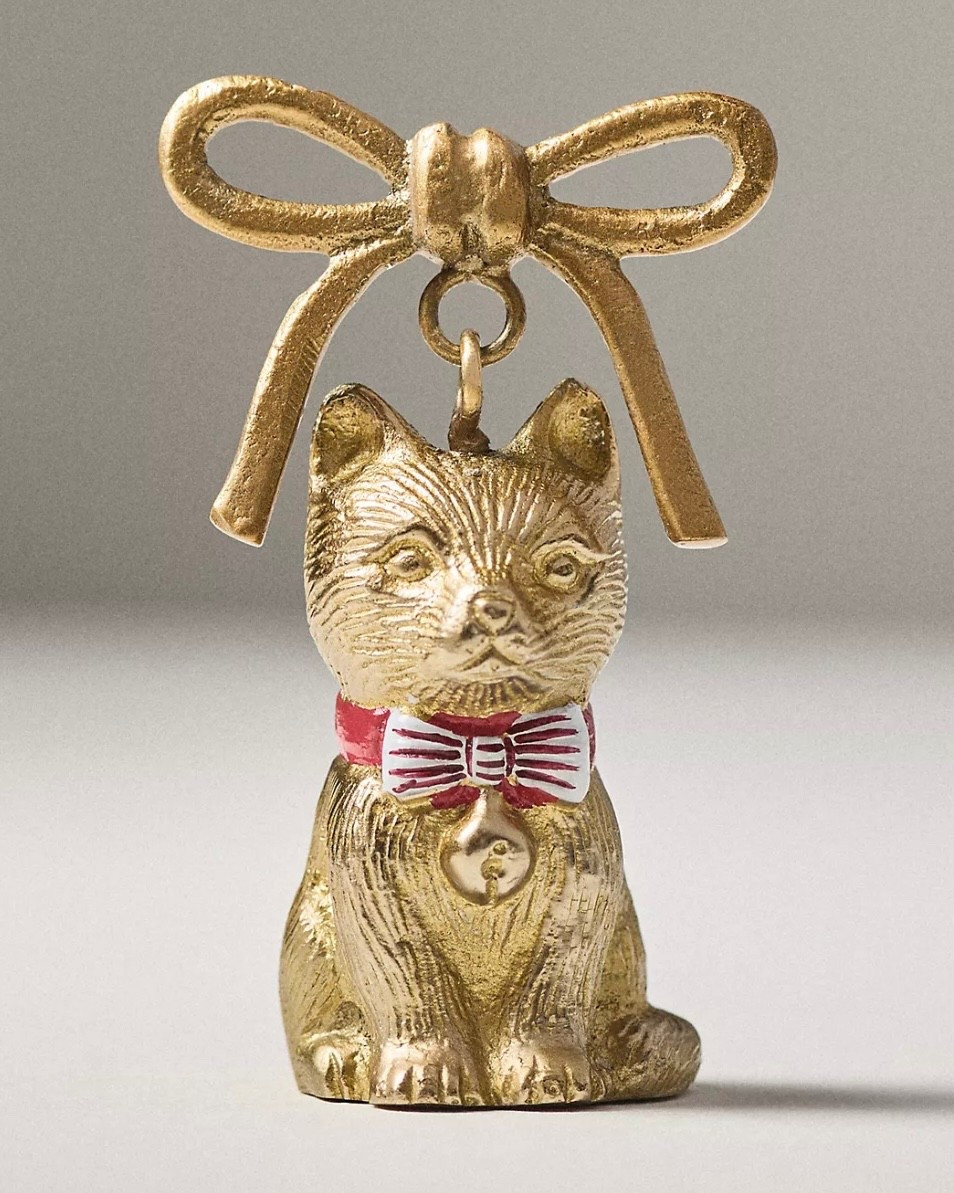 The Anthropologie Brass Cat Candle Snuffer is the chic little home accessory you didn’t know you needed — until now. This tiny metallic kitty puts out candles with zero smoke, zero fuss, and maximum attitude. It’s equal parts functional and fabulous, making it a perfect gift for cat lovers, candle lovers, or anyone who appreciates a touch of cozy whimsy.

A small detail that makes the whole space feel a little more magical. ✨🐈‍⬛

#LTKCyberWeek #LTKGiftGuide #LTKHoliday