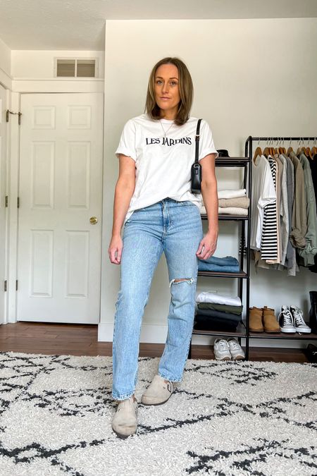 Summer outfit idea. Casual outfit idea. Graphic tee. Straight leg jeans. Clogs. 

Sizing
Tee is a small, but I actually just ordered it in a medium because I wanted it to fit a bit bigger.
Jeans are a 6 (a size up from my usual size).
Clogs are a half size up from my usual size.

#LTKunder100 #LTKunder50 #LTKstyletip