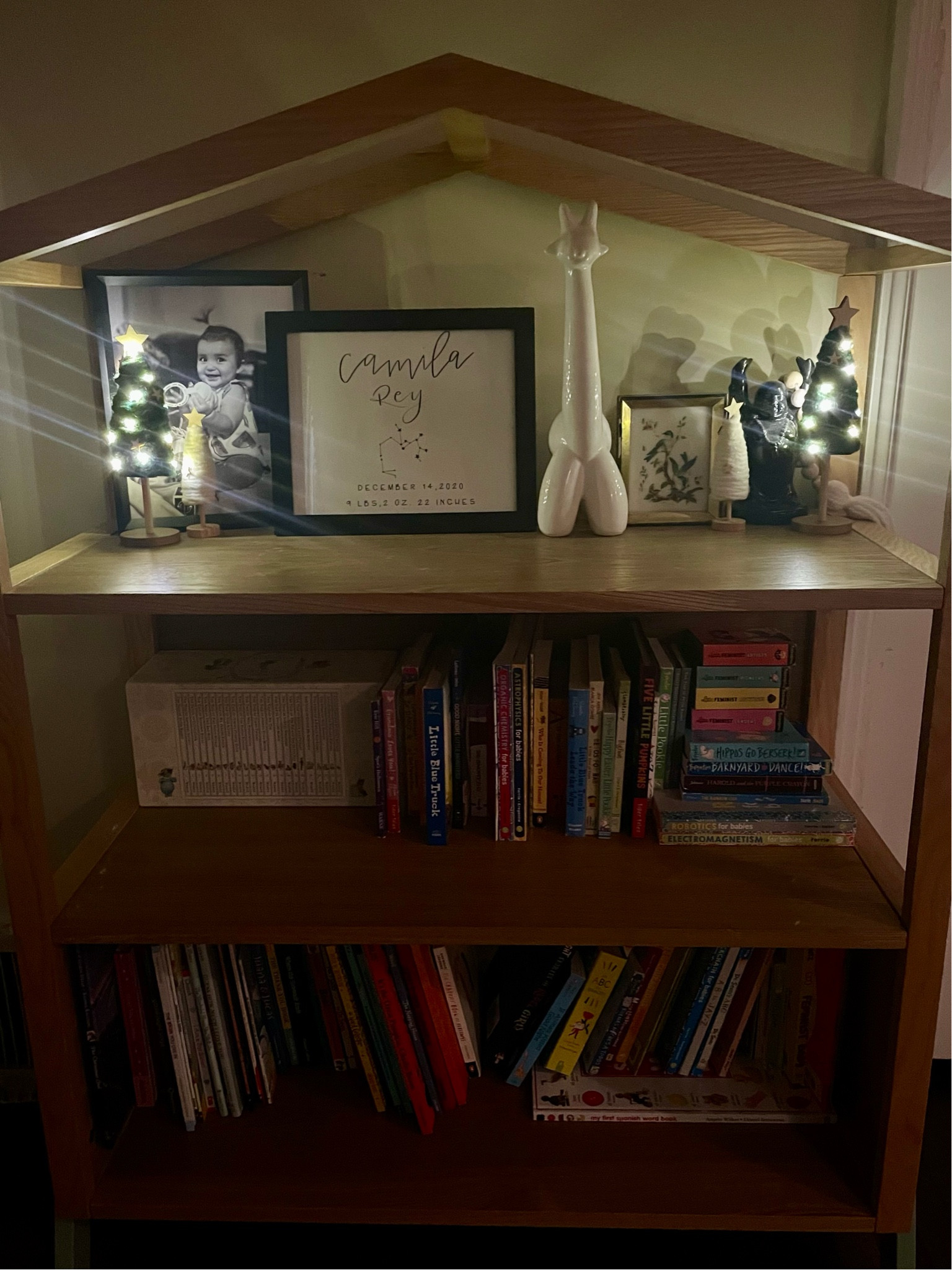 I’ve given up on keeping Camila’s bookshelf organized but these adorable mini light up trees from the dollar spot at Target make up for it ☺️🎄 You’ll have to check your local store for them but I’ve linked some similar styles (with and without lights) as well. Cami’s bookshelf is a few years old from World Market but I came across another one with even more shelves & cubbies - essentials if you have a bookworm toddler like I do! 📚

#LTKhome #LTKkids #LTKHoliday