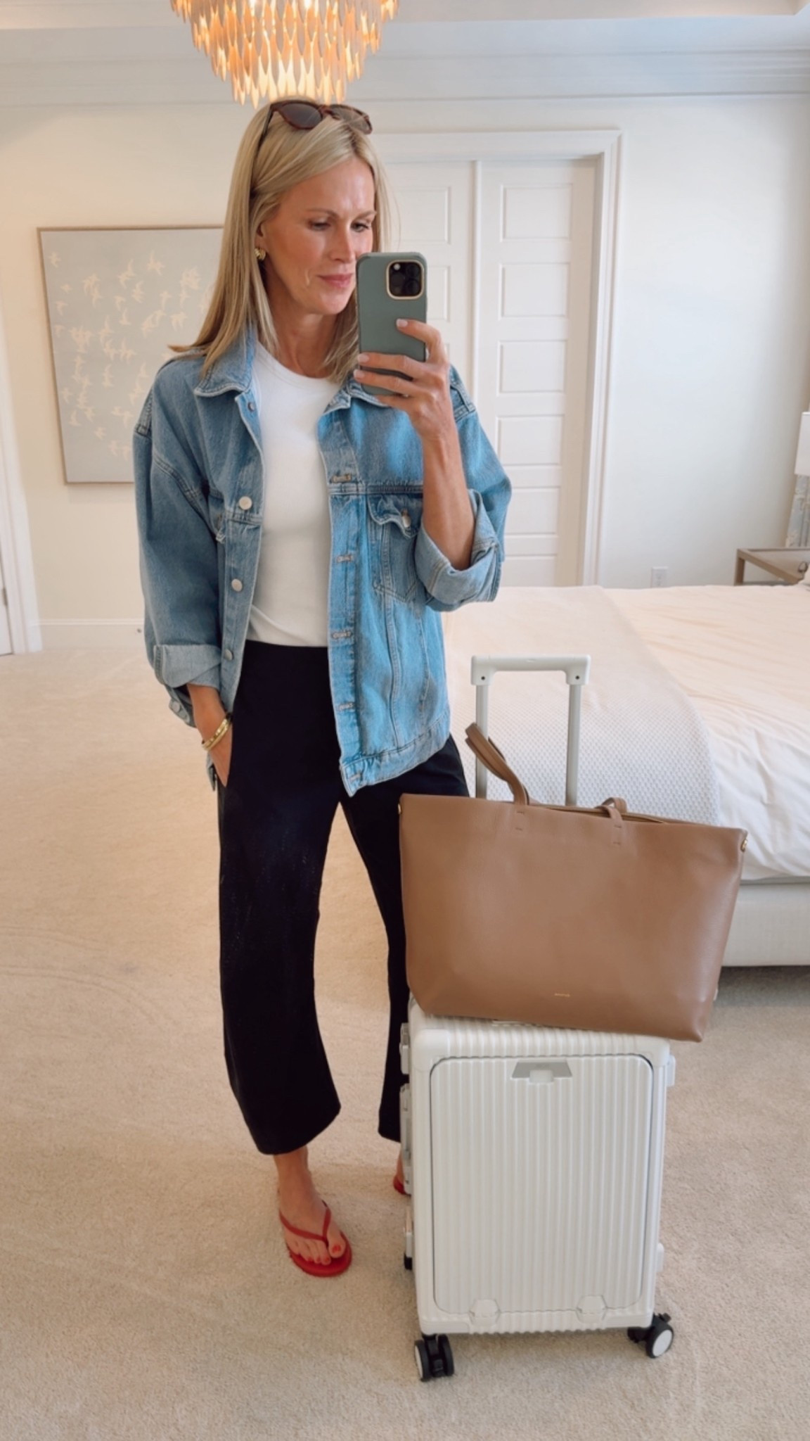 Travel outfits. Ruti, bra free tank, carry on luggage, Cuyana, denim jacket, Tkees

#LTKTravel #LTKmomlife #LTKOver40