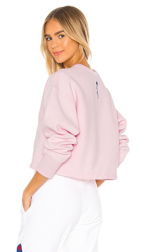 Champion Cropped Crewneck Sweatshirt in Pink. - size L (also in XS) | Revolve Clothing (Global)