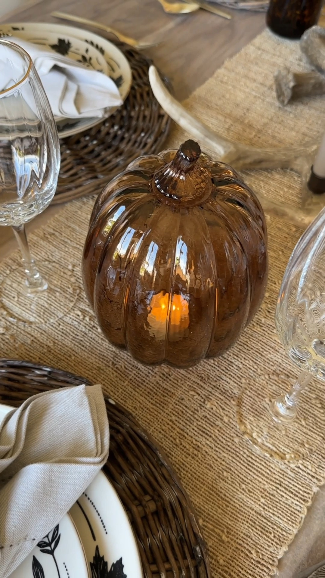 Amber glass pumpkins are my favorite for fall.  Add a flameless candle so they glow at night.  Creates a warm and cozy vibe to any space you add them too.

#LTKHome #LTKSeasonal