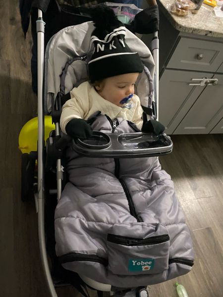 We LOVED this stroller bunting bag from Amazon. Our exact one is under $50 and kept Henry warm & toasty in 30 deg temps! It has a drawstring where you can cinch their little hands inside, plus pull-throughs for all stroller straps. It fits perfectly with our Uppababy Cruz stroller! 

#LTKunder50 #LTKkids #LTKbaby