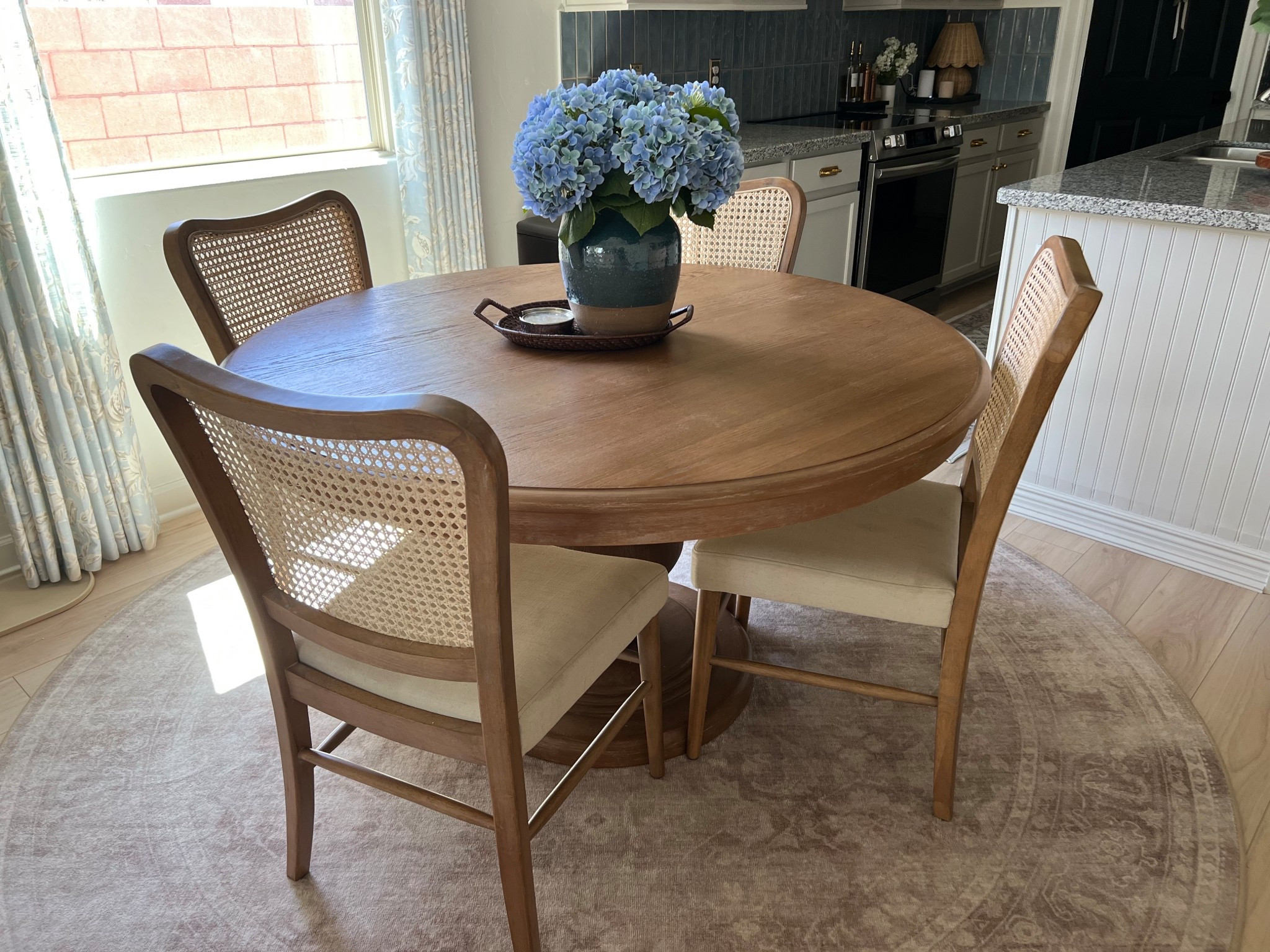Simple dining 🌿  rug is currently 30% off. I have the tufted version with the regular pad. The table is no longer available in this color but I added a link for the same table and the antiqued brown looks beautiful and rich. 

#LTKHome #LTKSaleAlert
