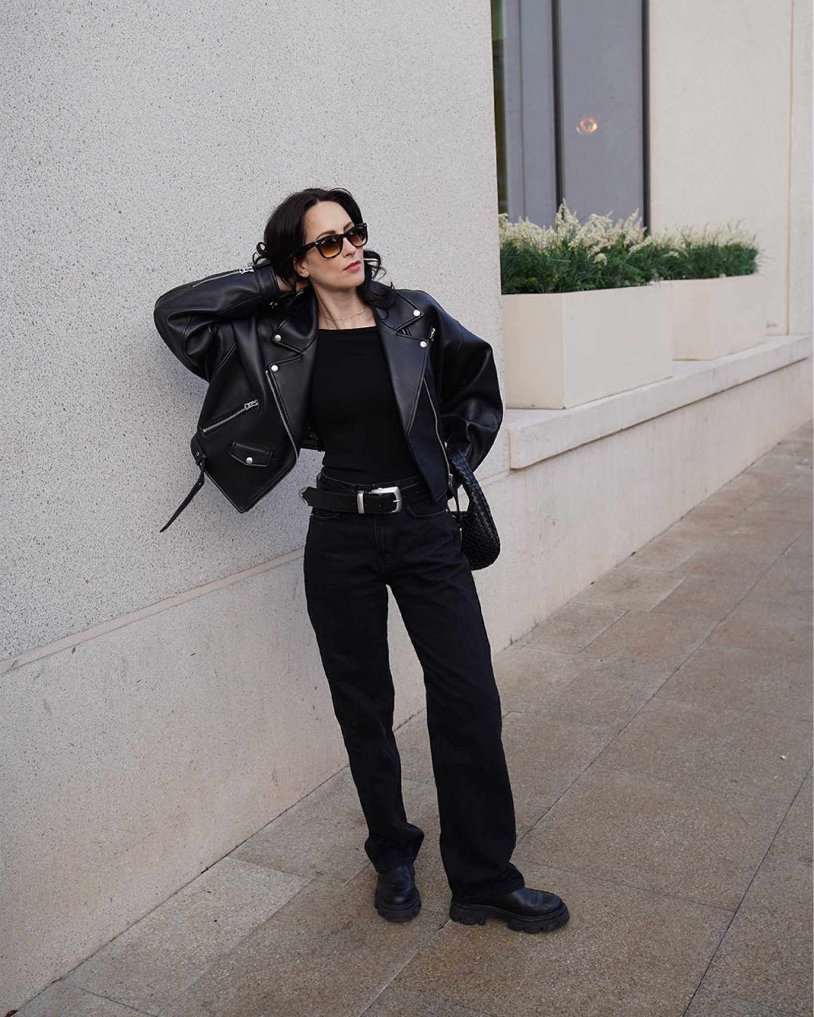 leather blazer by ducie alternative by whistles 
off the shoulder top by arket 
chelsea boots by ganni 
belt by khaite alternative by arket 
wide leg jeans by na-kd alternative by monki 
sunglasses by Rayban 
bag (bottega dupe) by anthropologie 
all black outfit 
leather jacket style 

#LTKstyletip #LTKeurope #LTKSeasonal